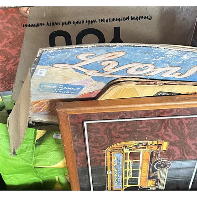 A collection of vintage advertising signs to include Lyons' ...