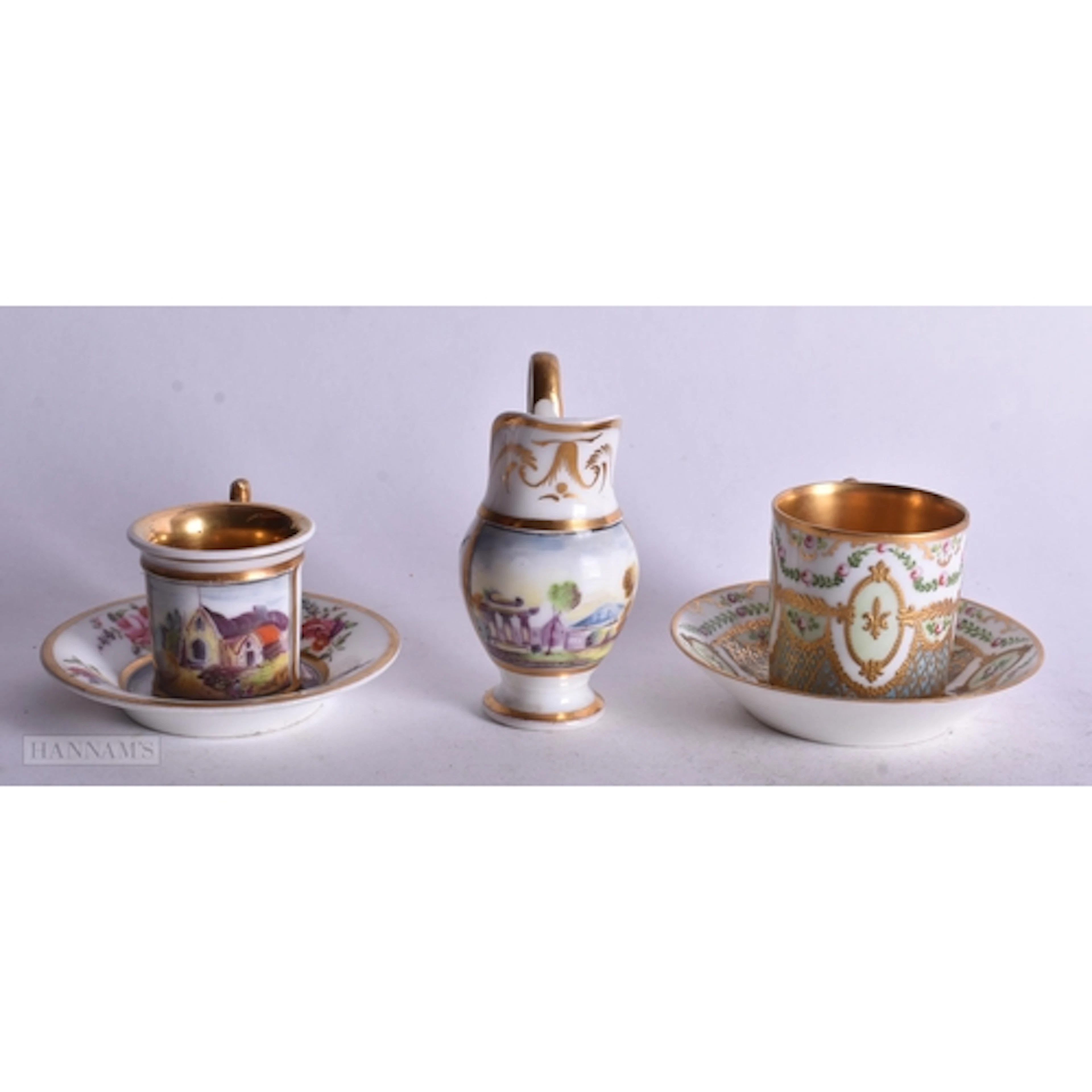 Paris porcelain demi-tasse can and saucer painted with flowe...