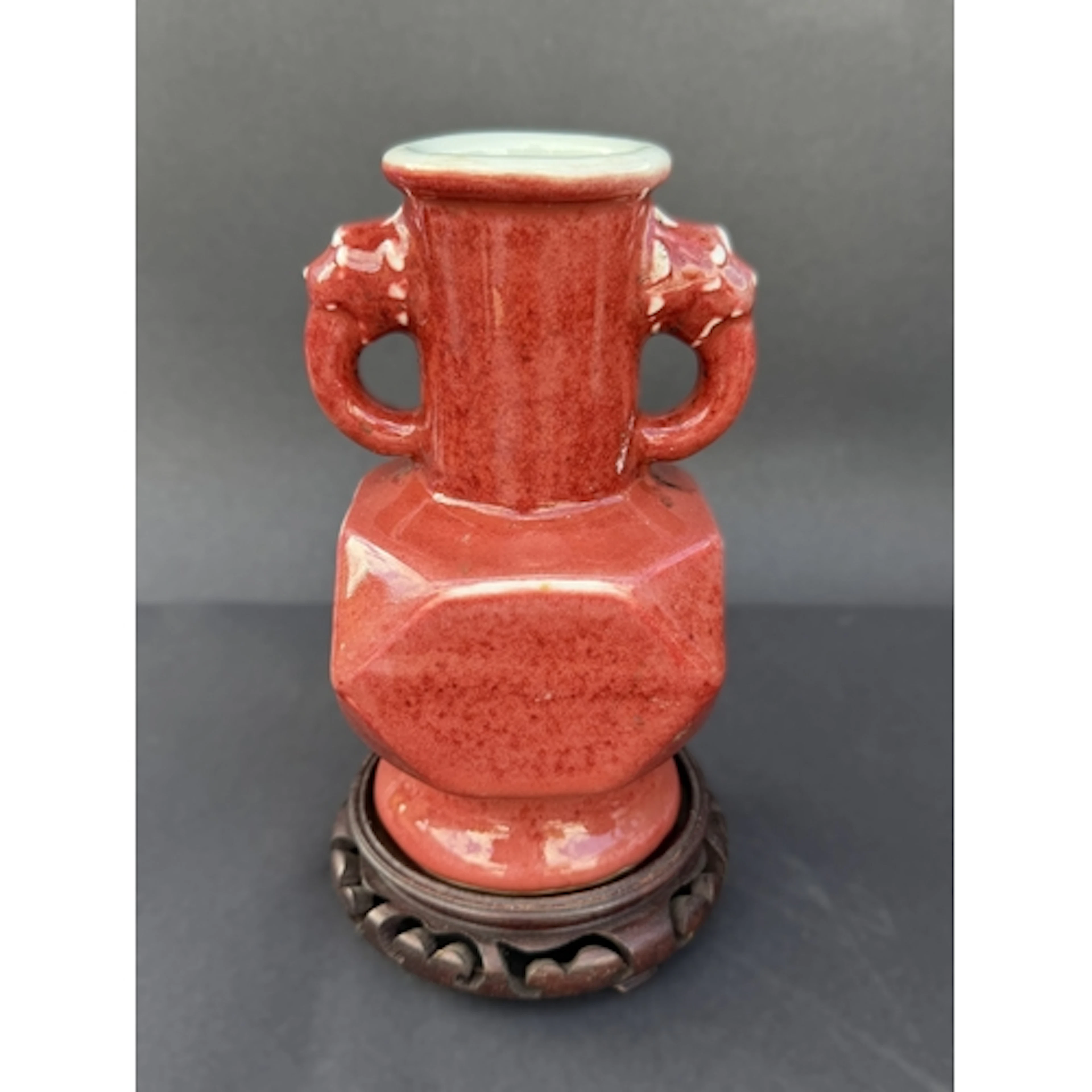 A Chinese sang-de-boeuf glazed shaped square bodied vase wit...