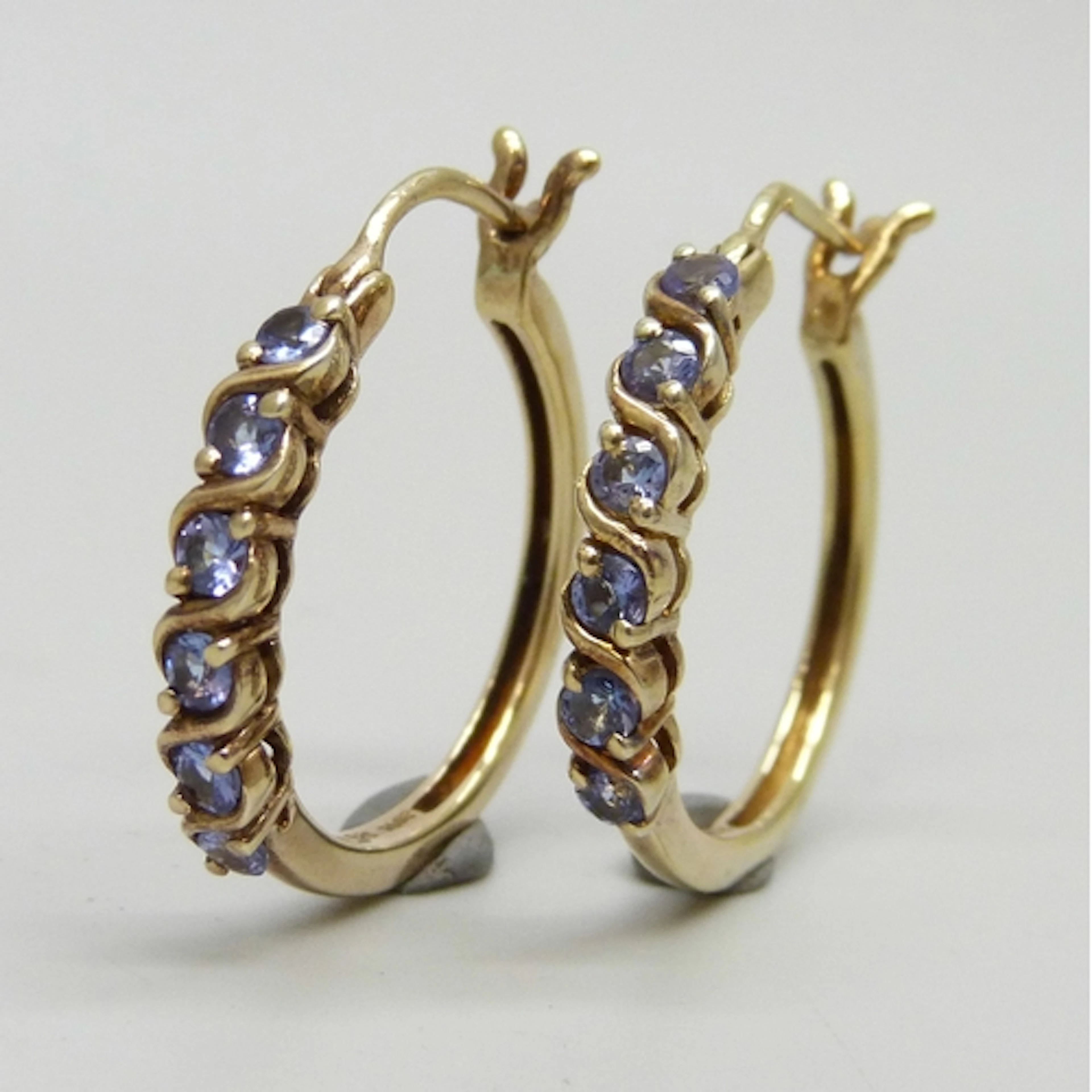 A pair of silver gilt and iolite hoop earrings, 2.4cm