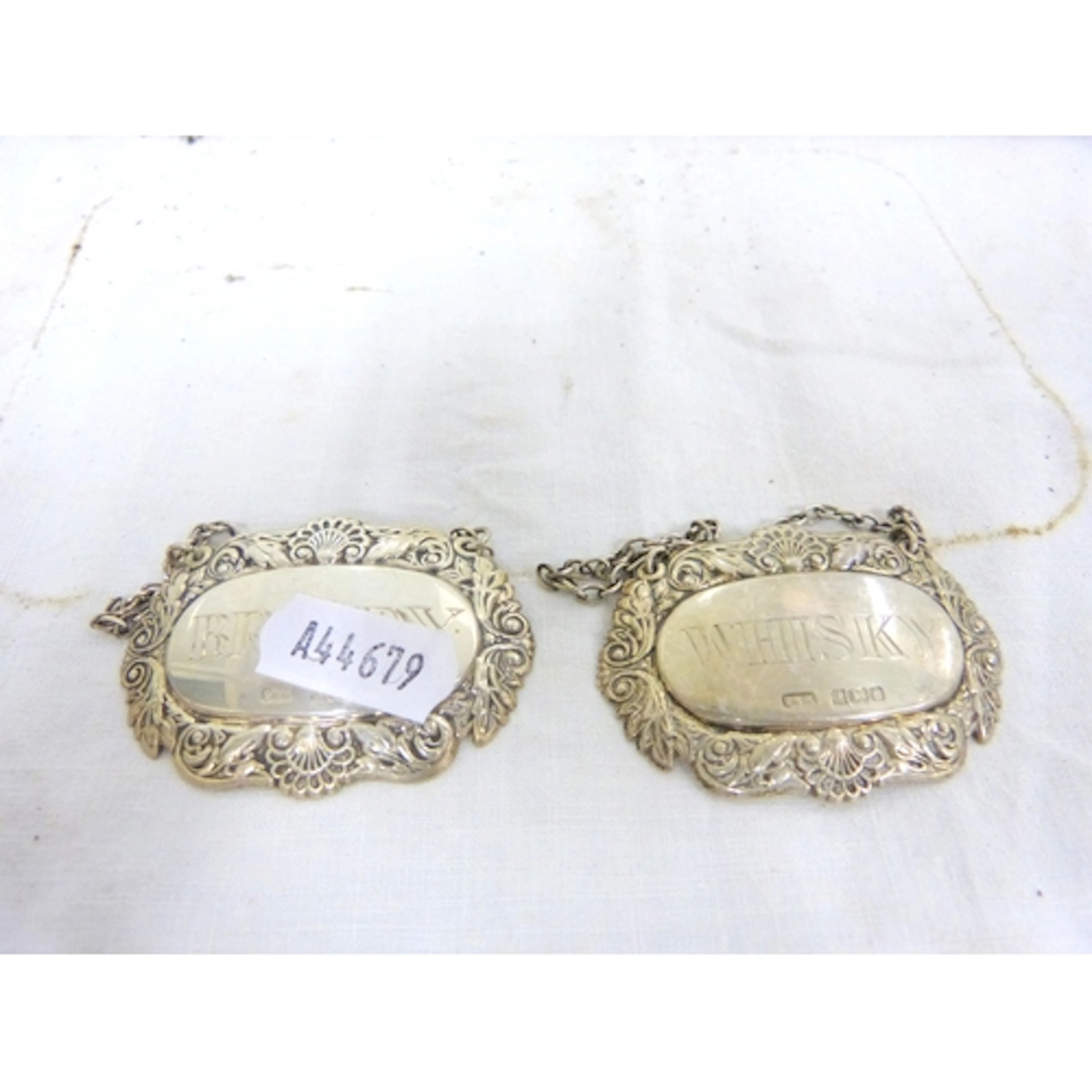 Pair of silver decanter labels Brandy and Whisky by Lawrence...