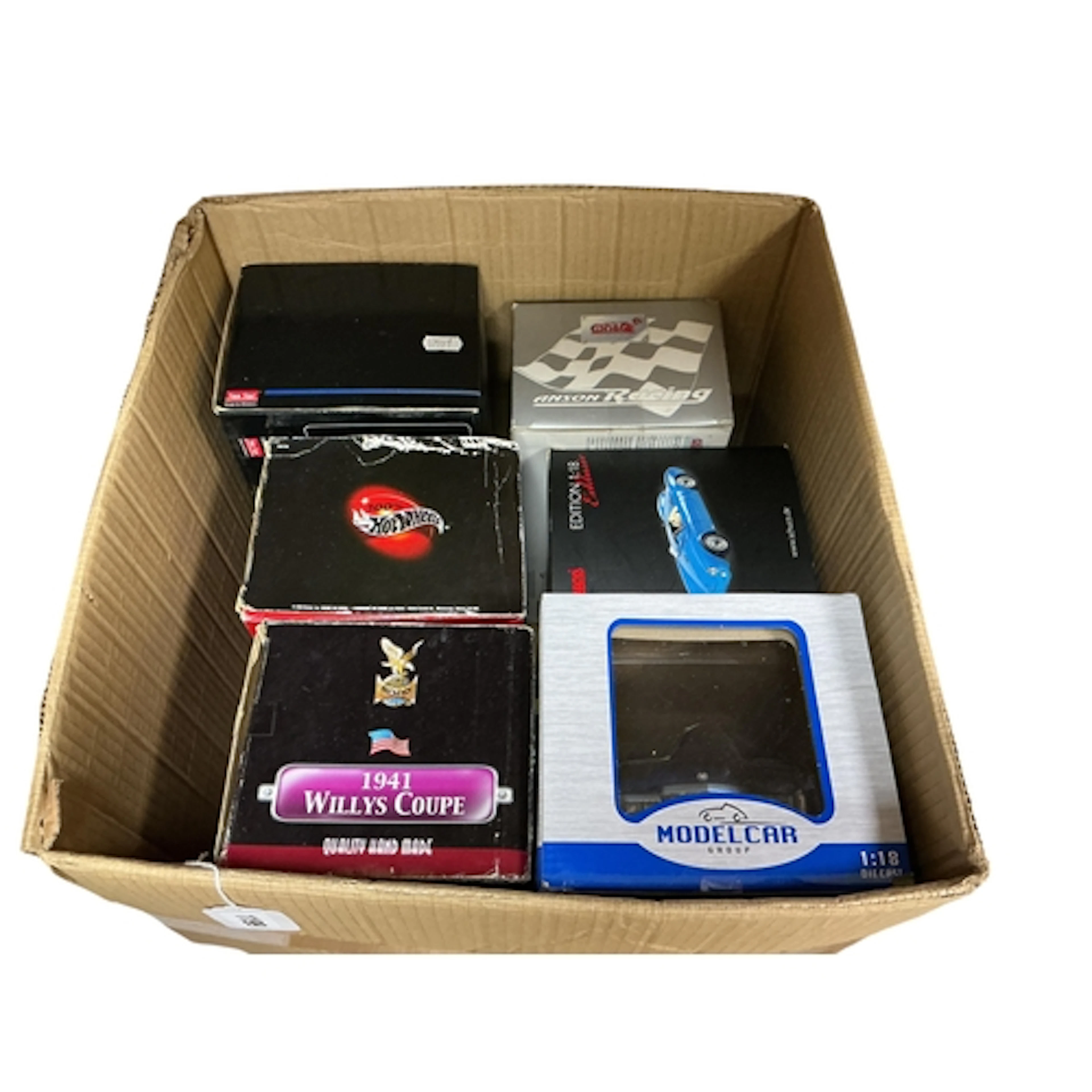 Six boxed 1:18 scale diecast cars by various makes, includin...