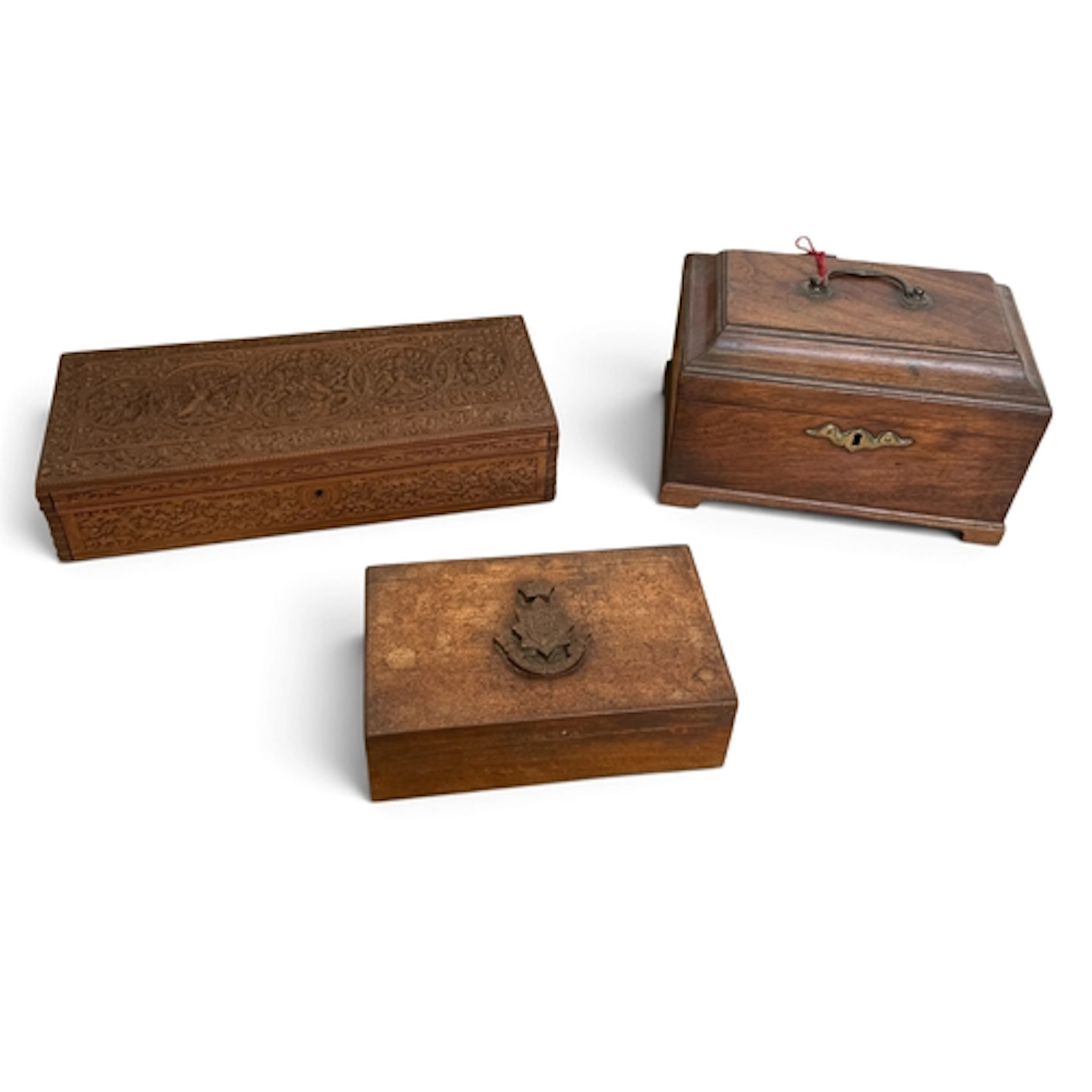 A GEORGE III MAHOGANY TEA CADDY Together with an indian carv...