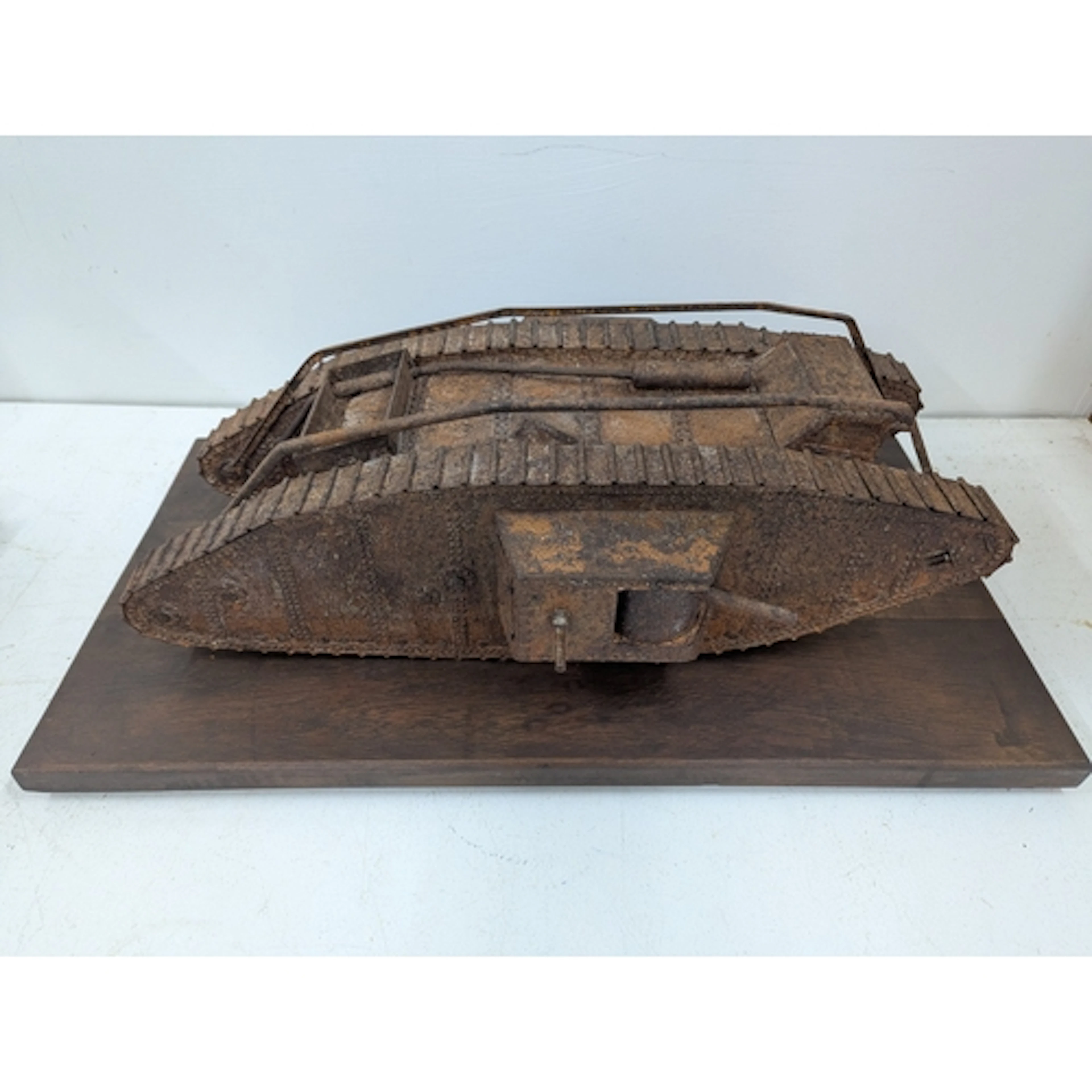 A scratch built model of a British Mark IV war tank, mounted...