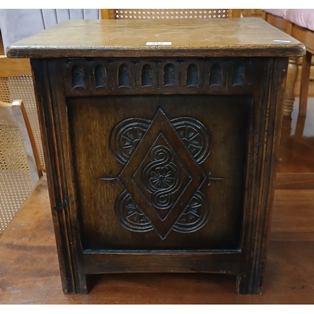 Carved oak coal box.