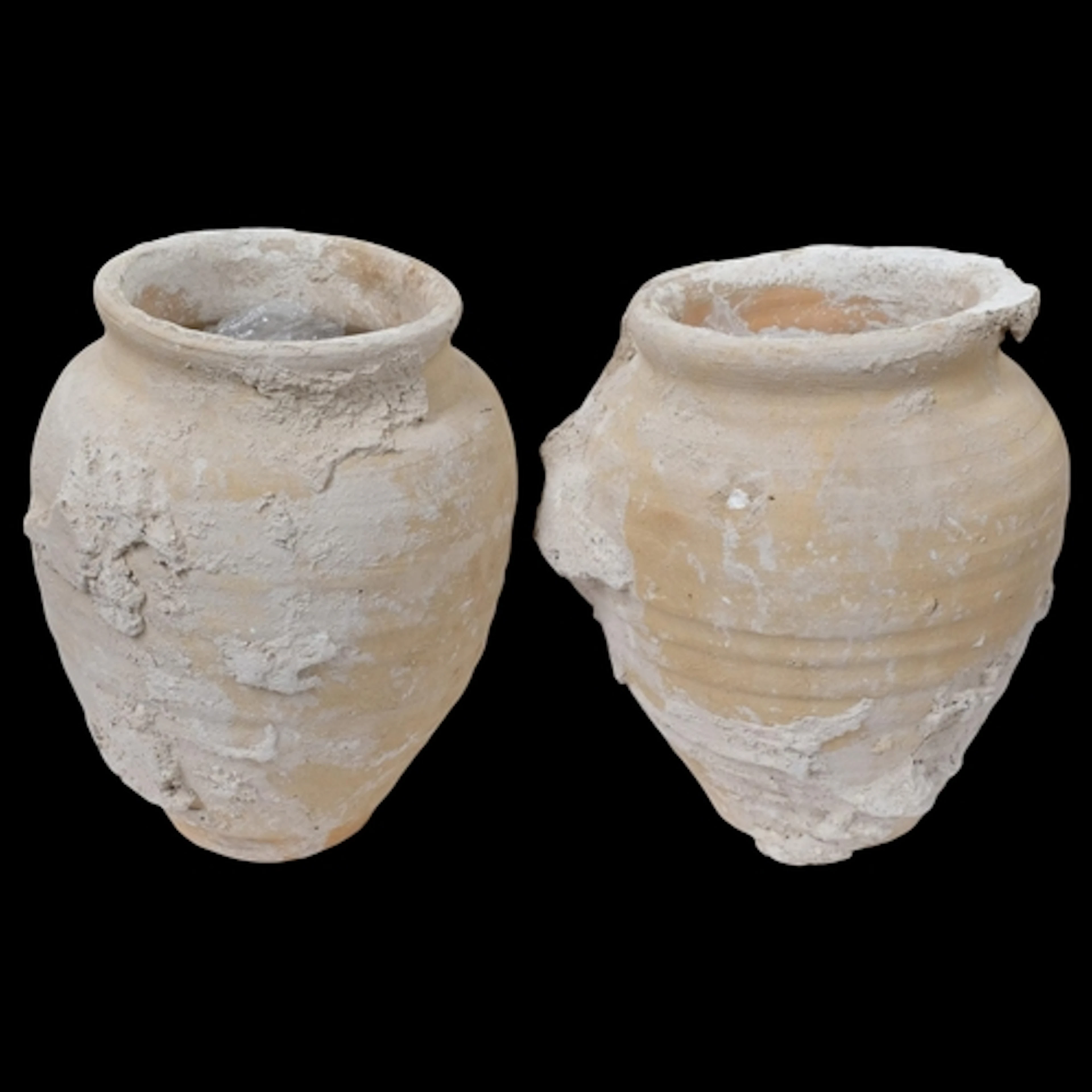 A pair of studio pottery Andalusian style ribbed vases, unsi...