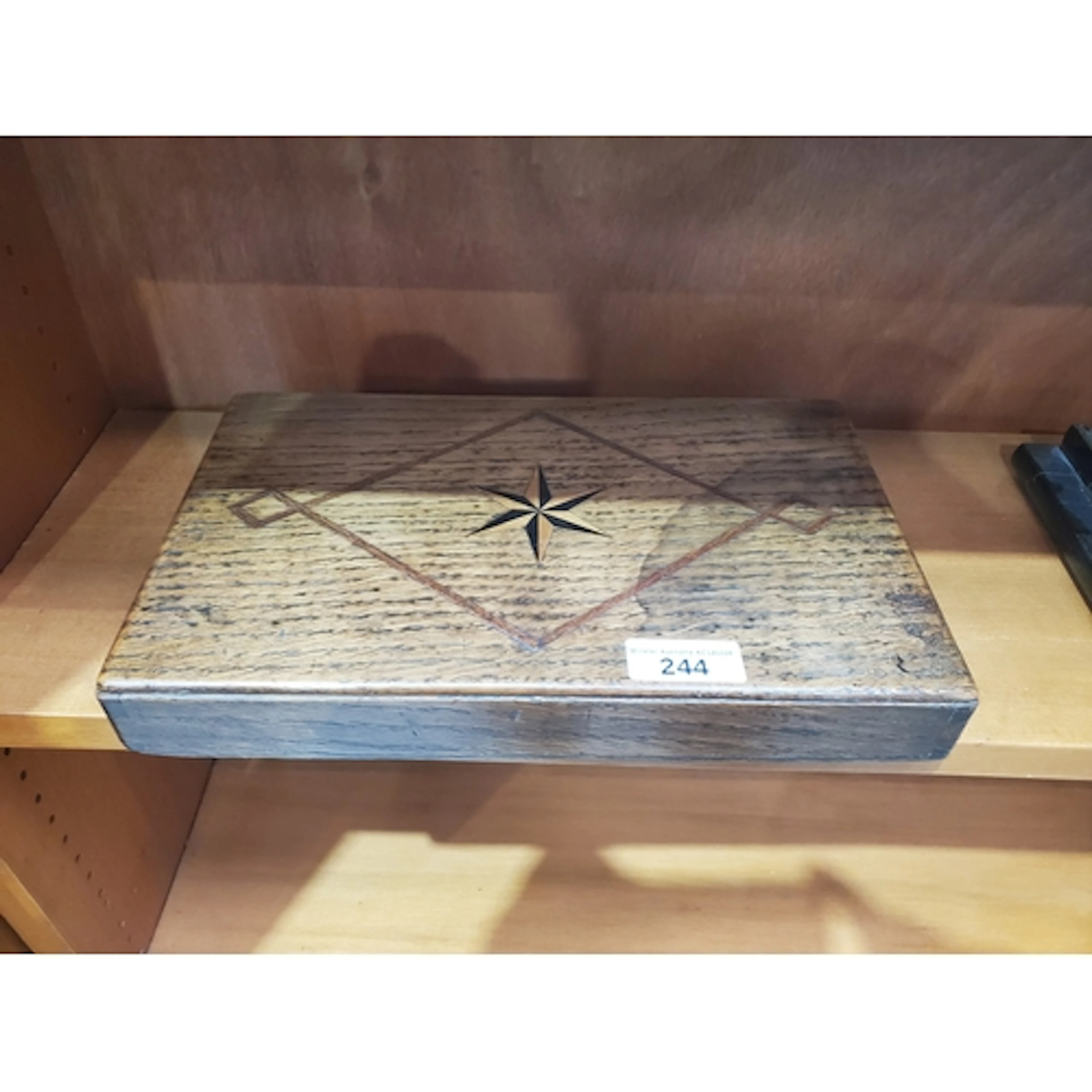 An antique oak shallow Box with star and geometric inlay, 10...