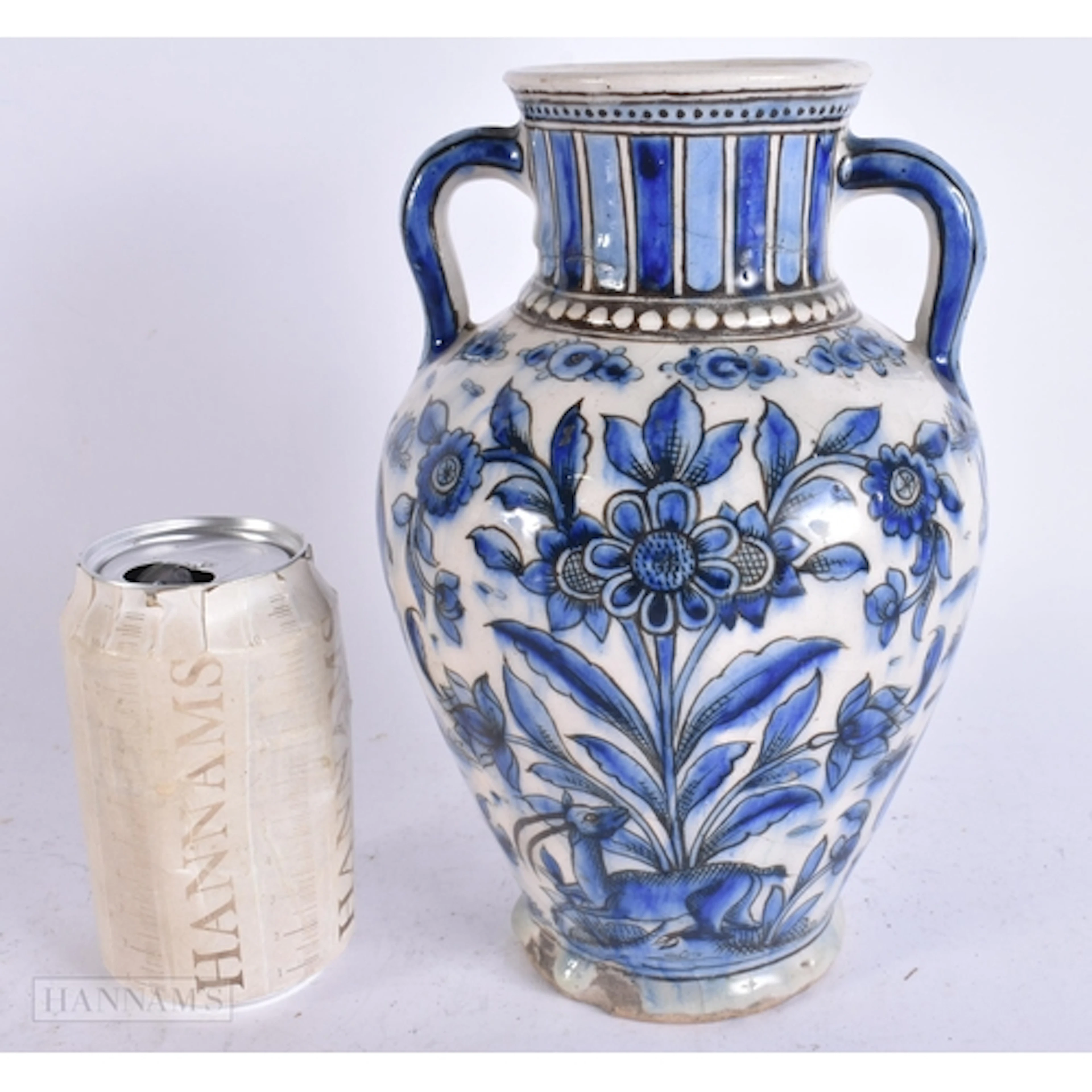 A 19TH CENTURY PERSIAN ISLAMIC TWIN HANDLED POTTERY VASE pai...