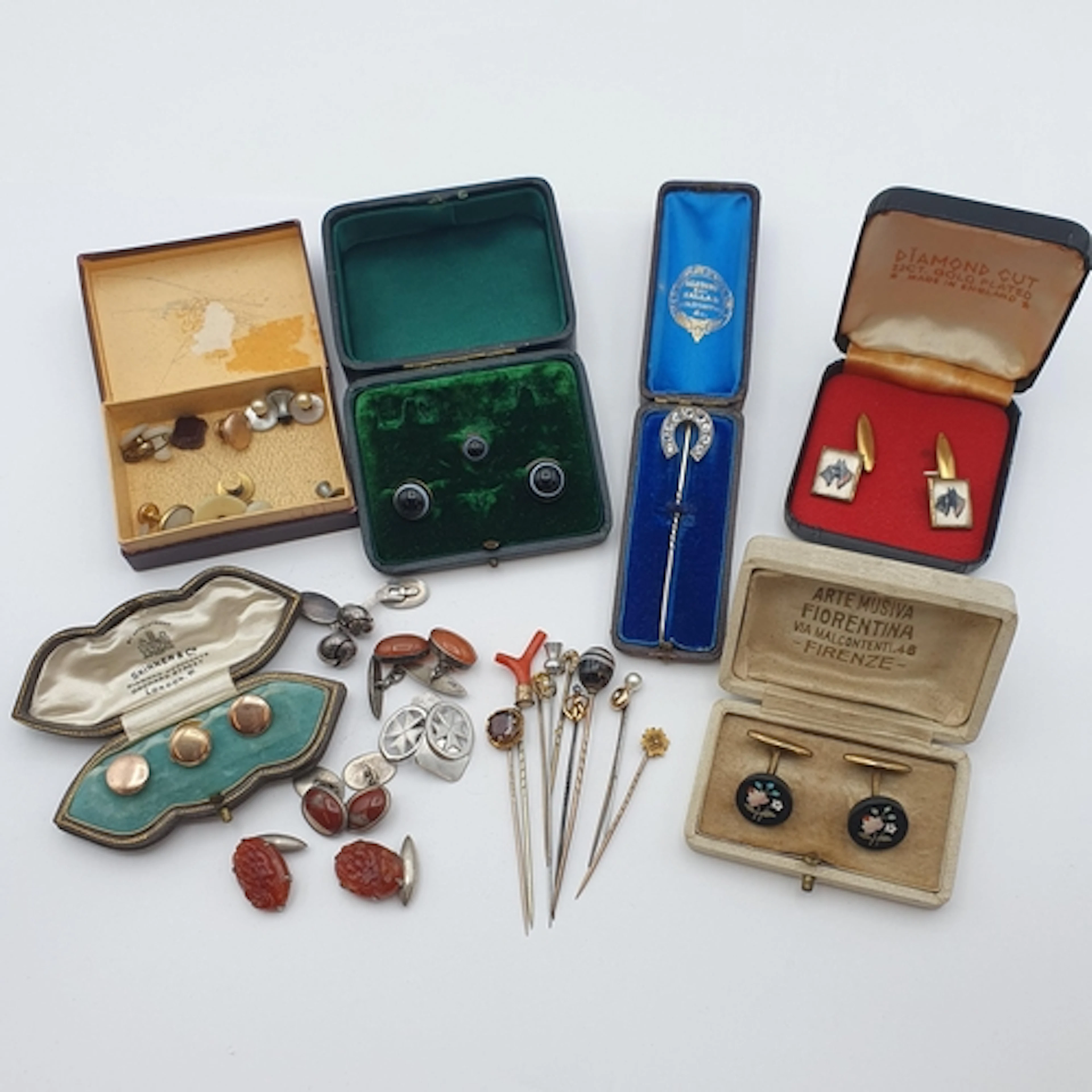 A boxed set of Italian Pietra Dura Cufflinks, a pair of Hans...