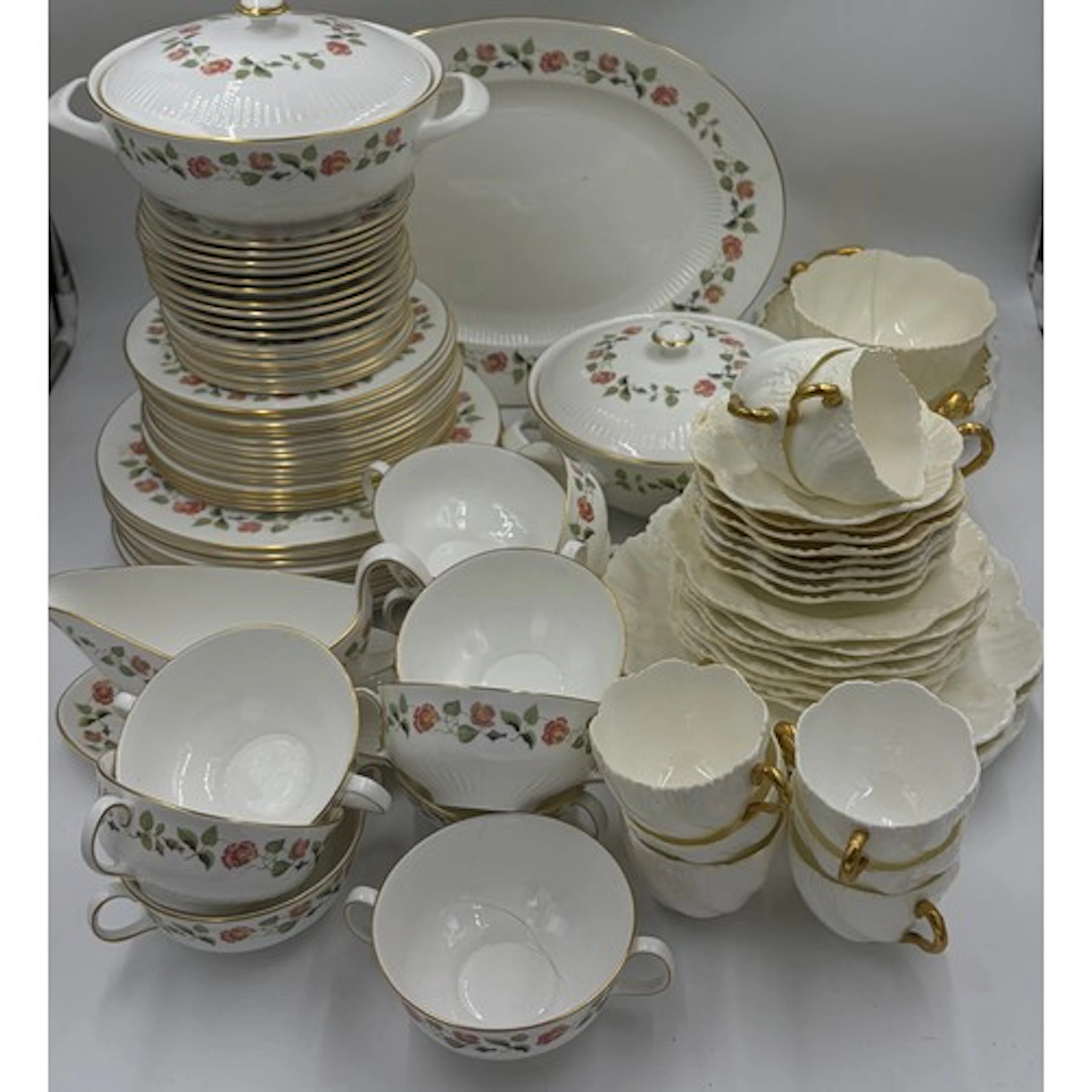 Wedgwood 'India Rose' pattern part dinner service comprising...
