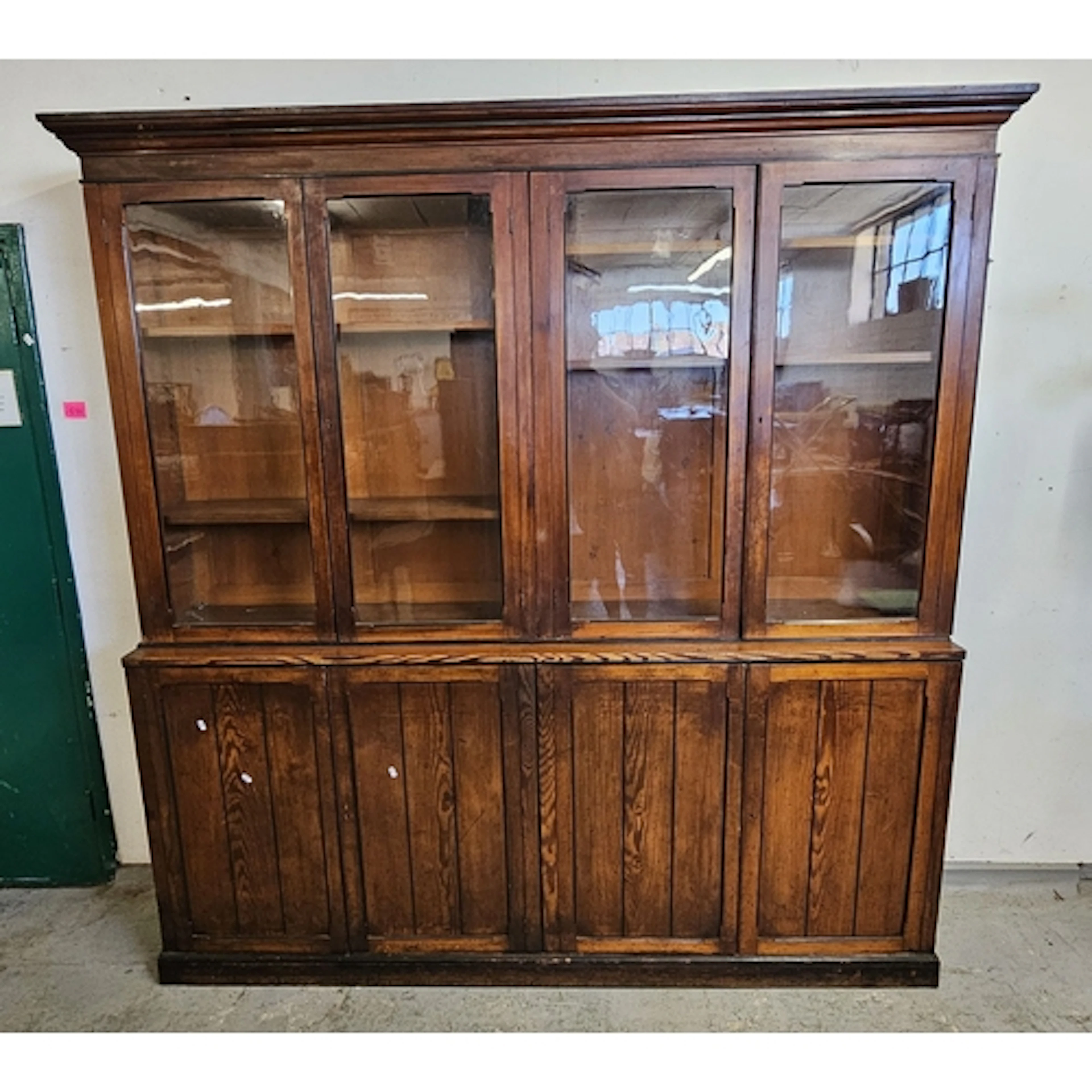 Antique 4 door Library bookcase with glazed doors over 4 cu...