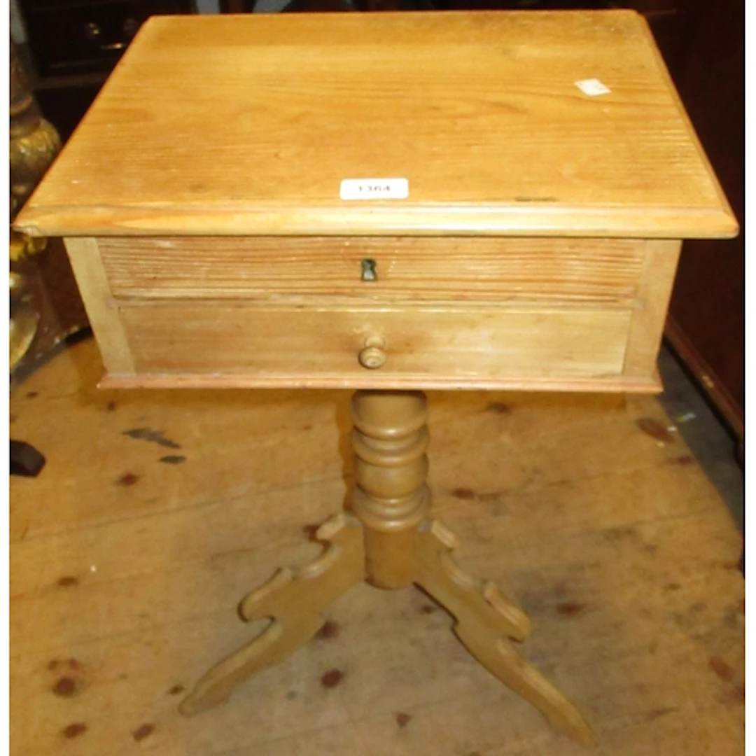 Stripped pine work table of two drawers on turned column and...