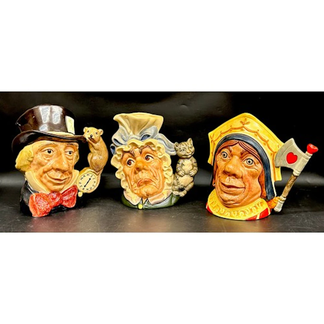 Three Royal Doulton Alice in Wonderland themed large charact...