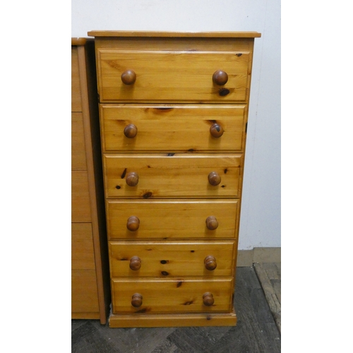 A modern pine tallboy chest of six drawers, 21