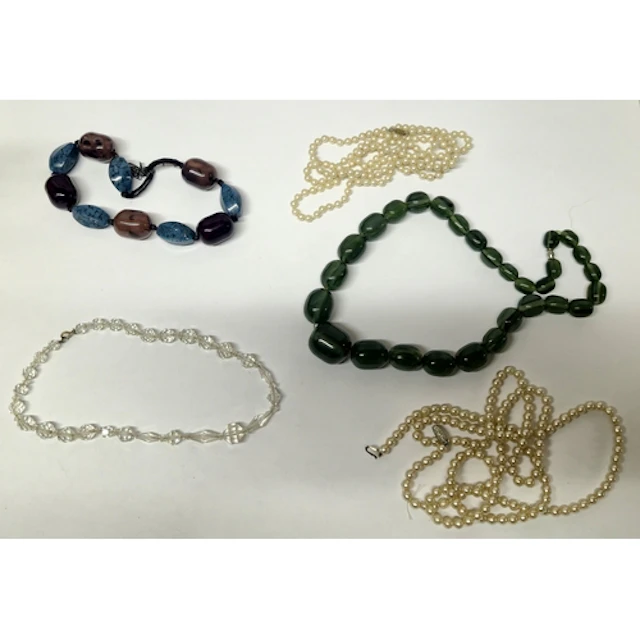 Collection of Mid Century style bead and simulated necklaces...