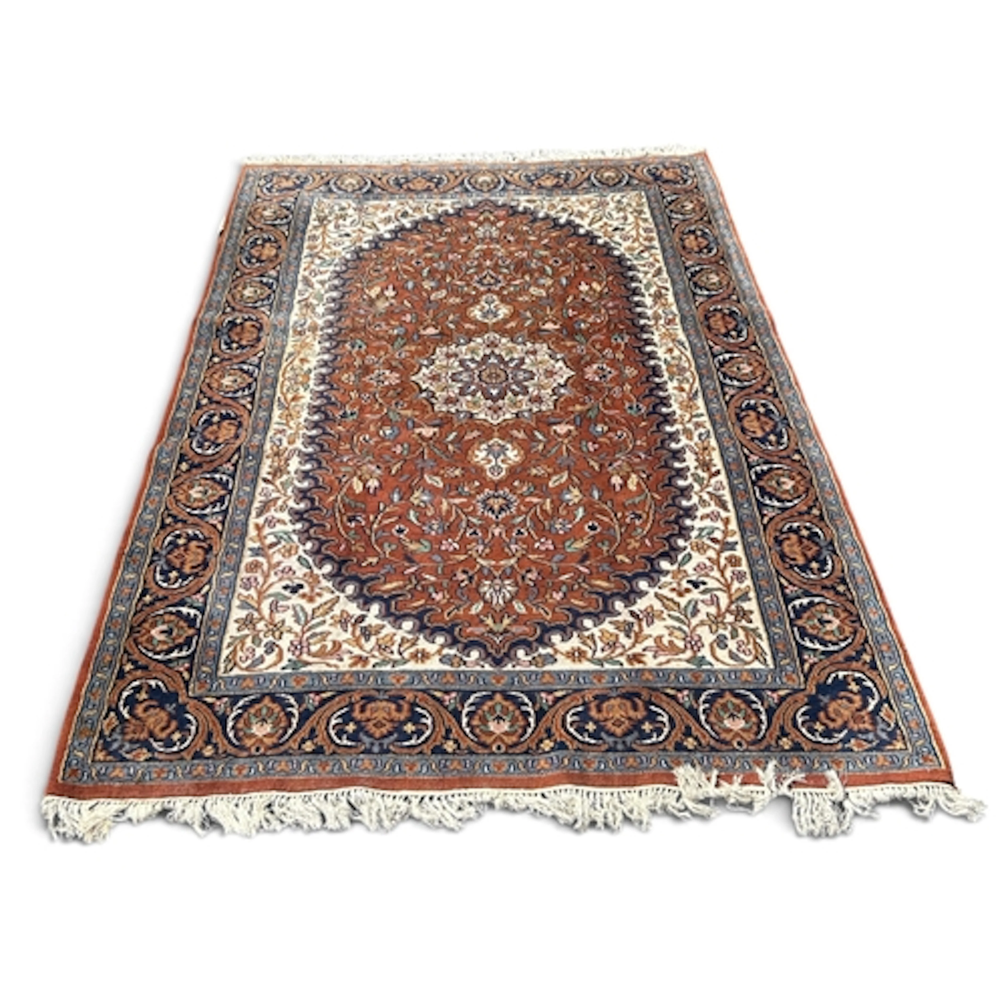 A PERSIAN CARPET 247 x 165cm.