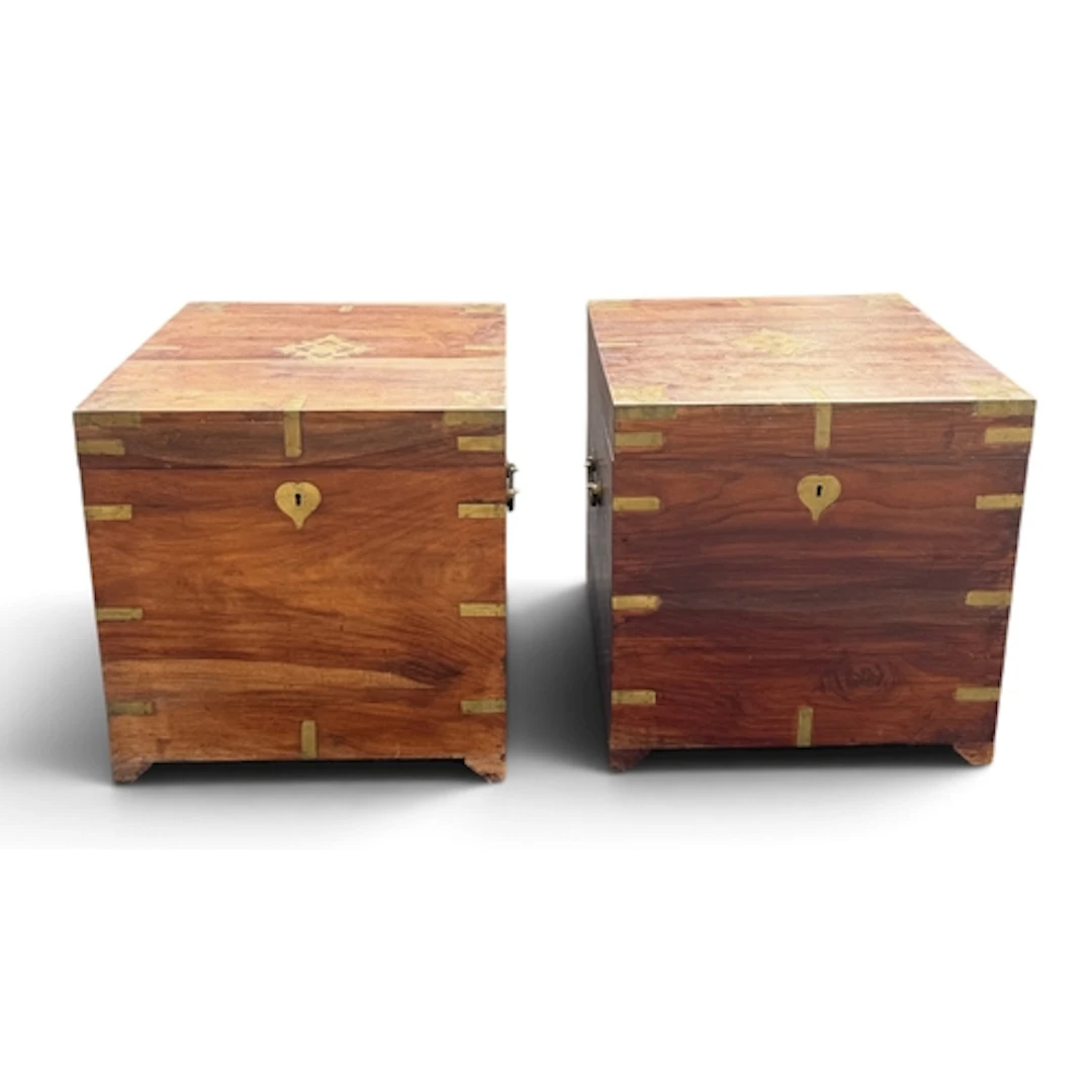 A PAIR OF CAMPHOR WOOD BRASS BOUND BEDSIDE CHESTS