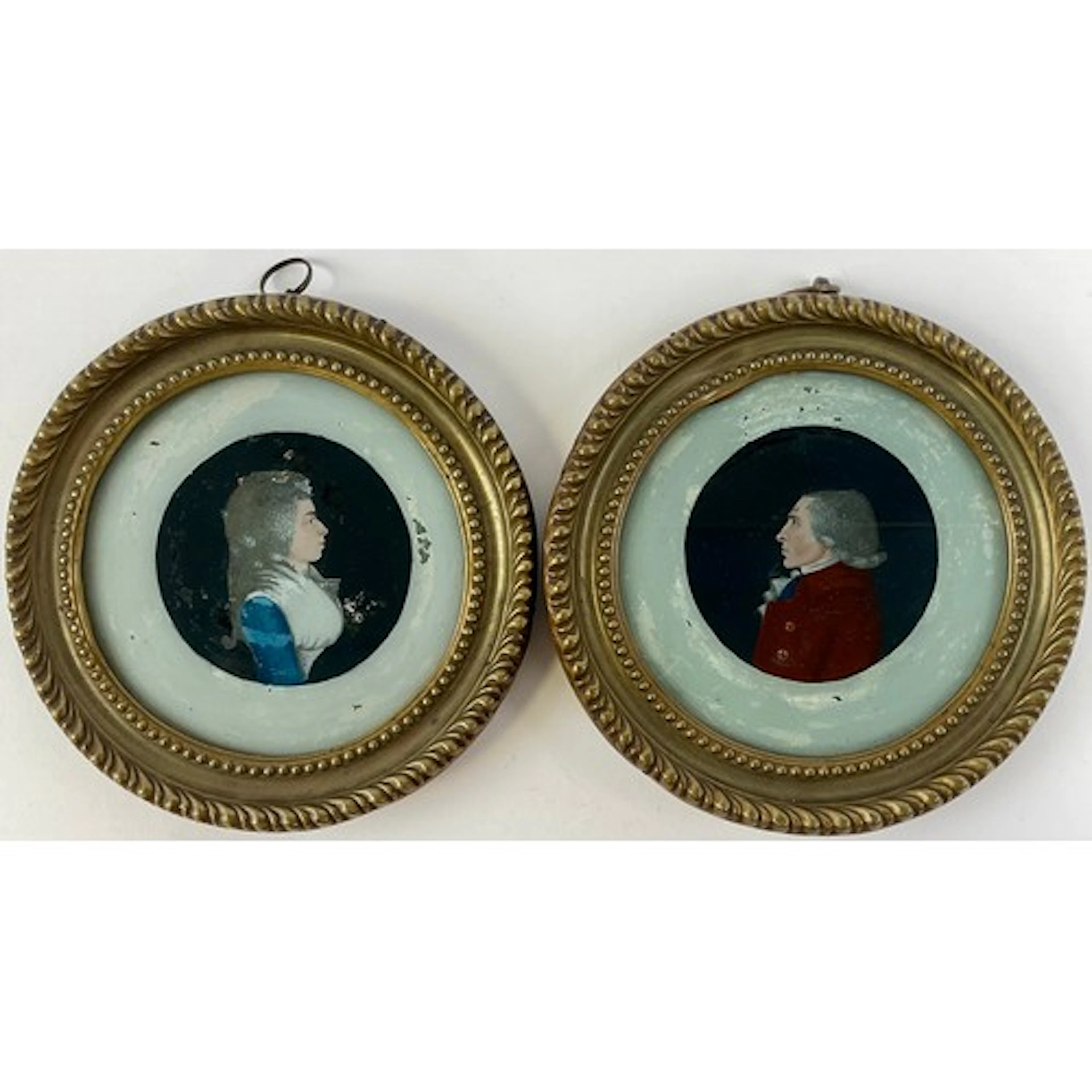 Danish School (18th century), a pair of reverse glass painte...