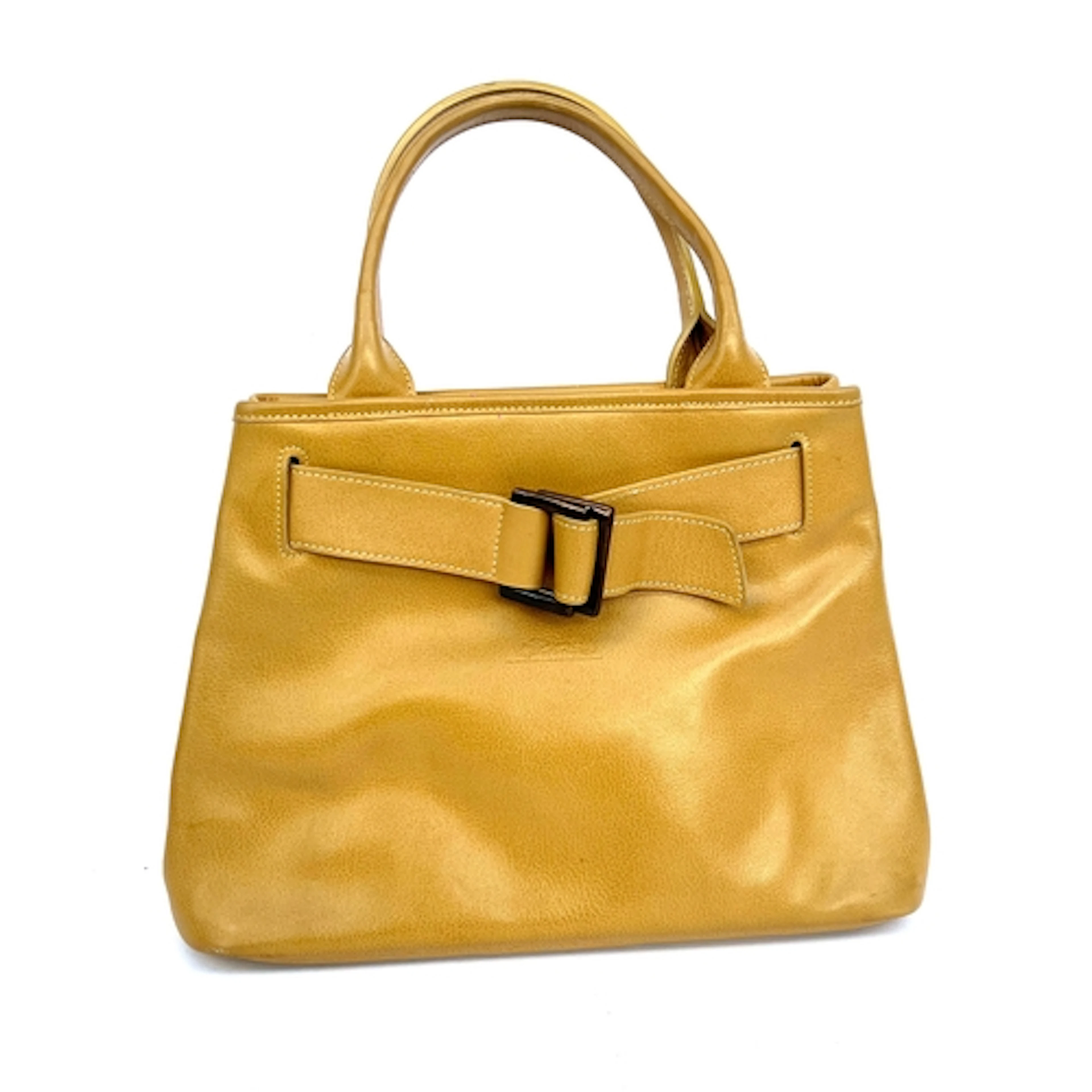 A Longchamp tan leather handbag with buckle detail, 33cmW