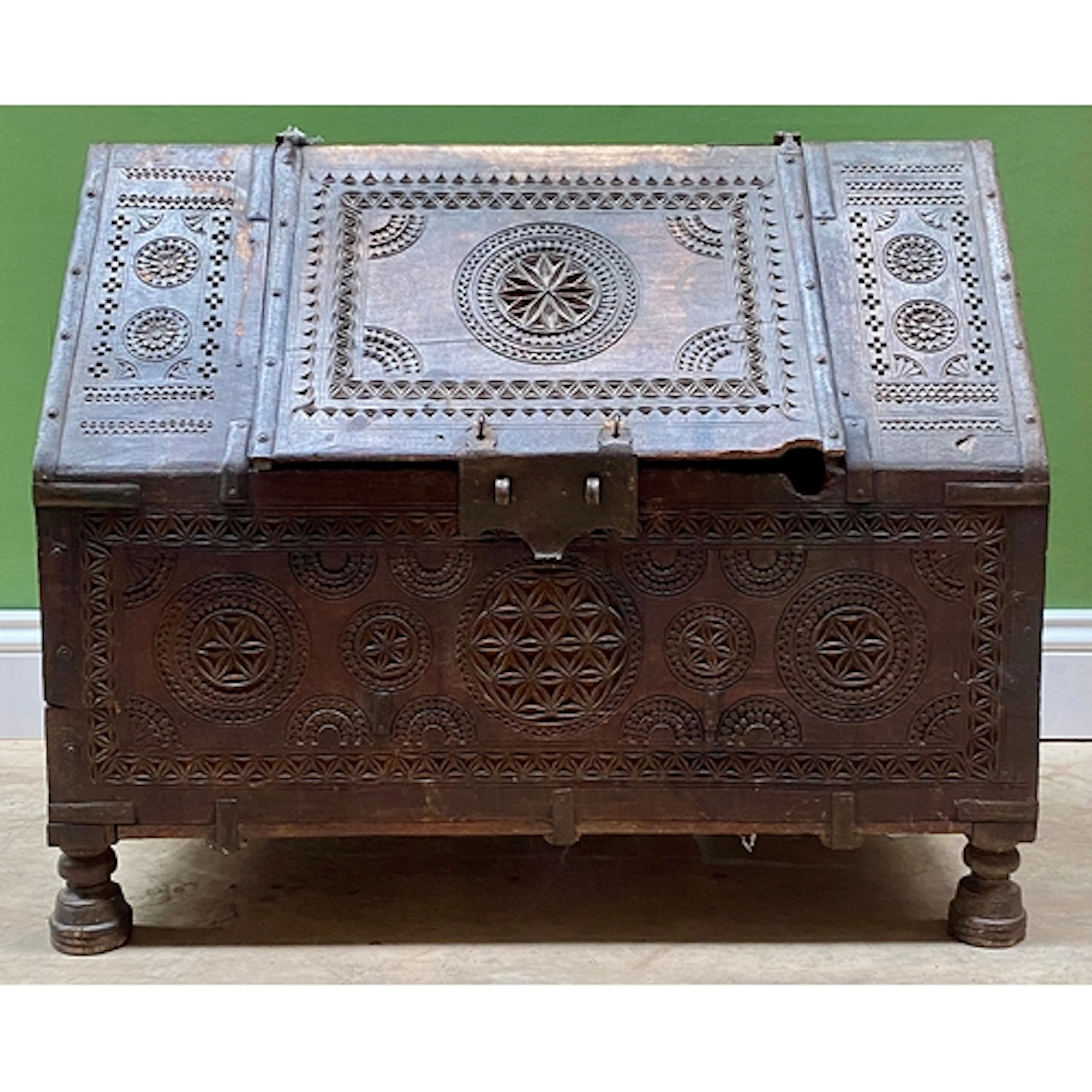 A 19th century carved Indian dowry chest, 79cmW