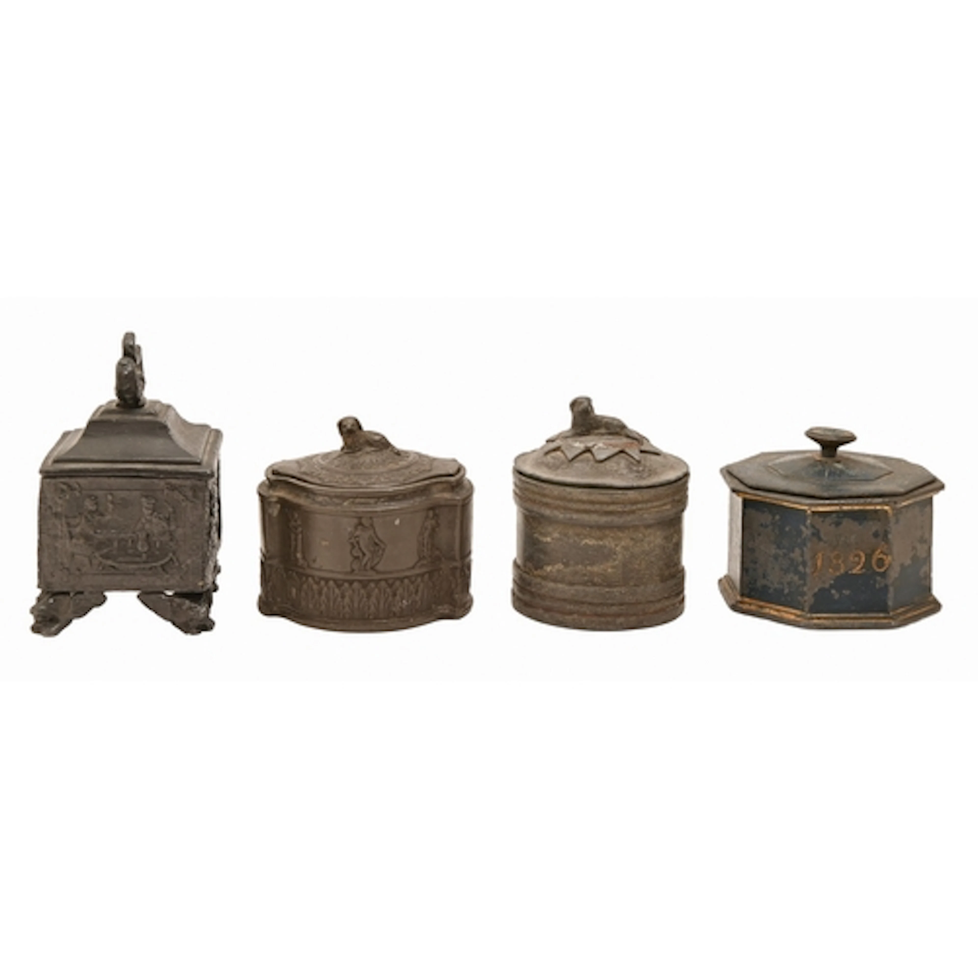 Four George IV-Victorian lead tobacco jars and covers, sever...