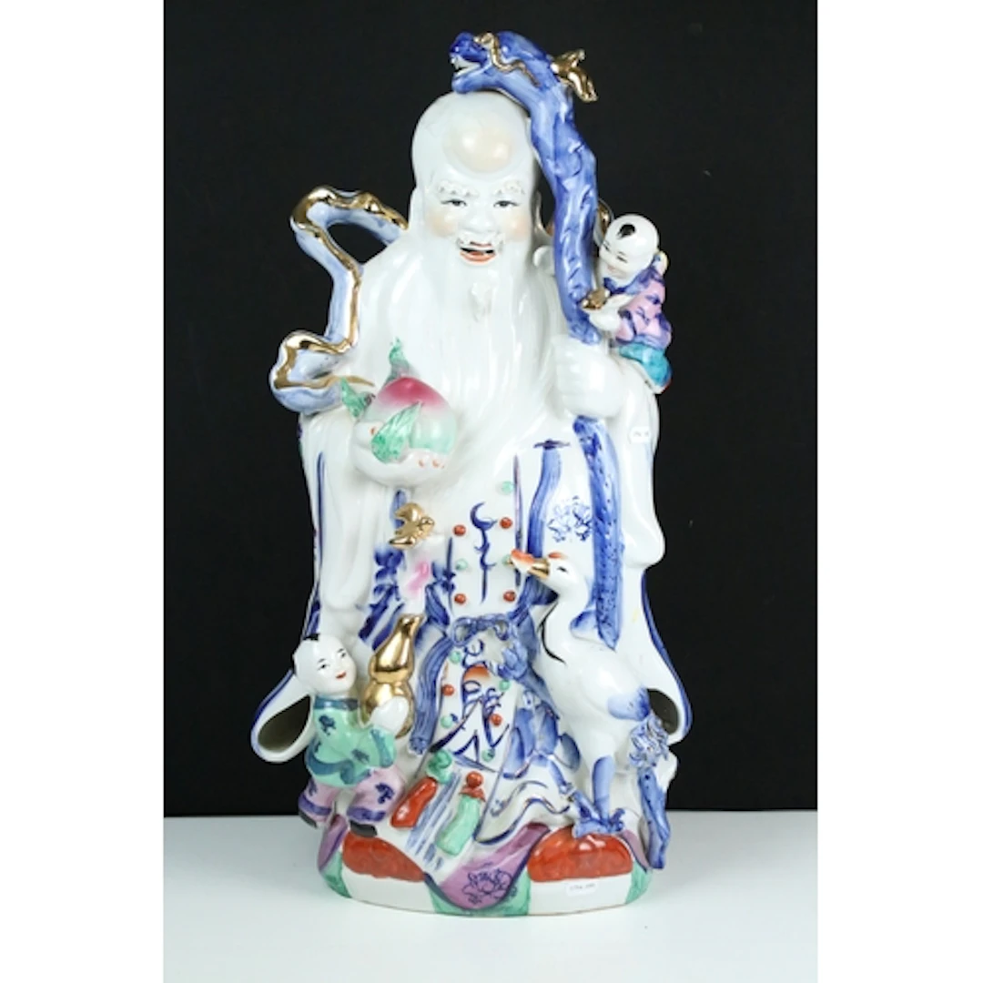 20th century porcelain figure of Shouxing with gilt accents,...
