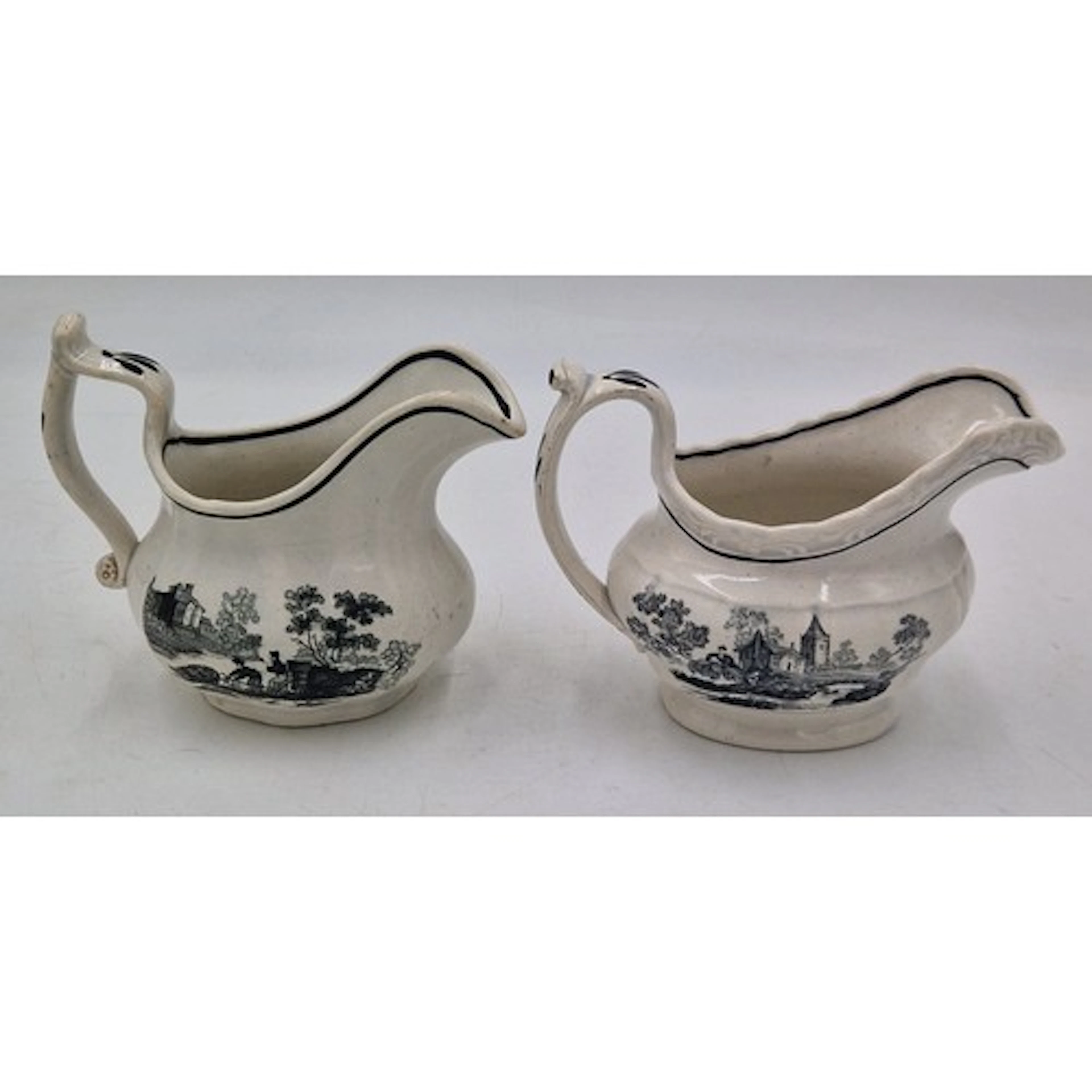 Two early 19th century black and white transfer printed Swan...