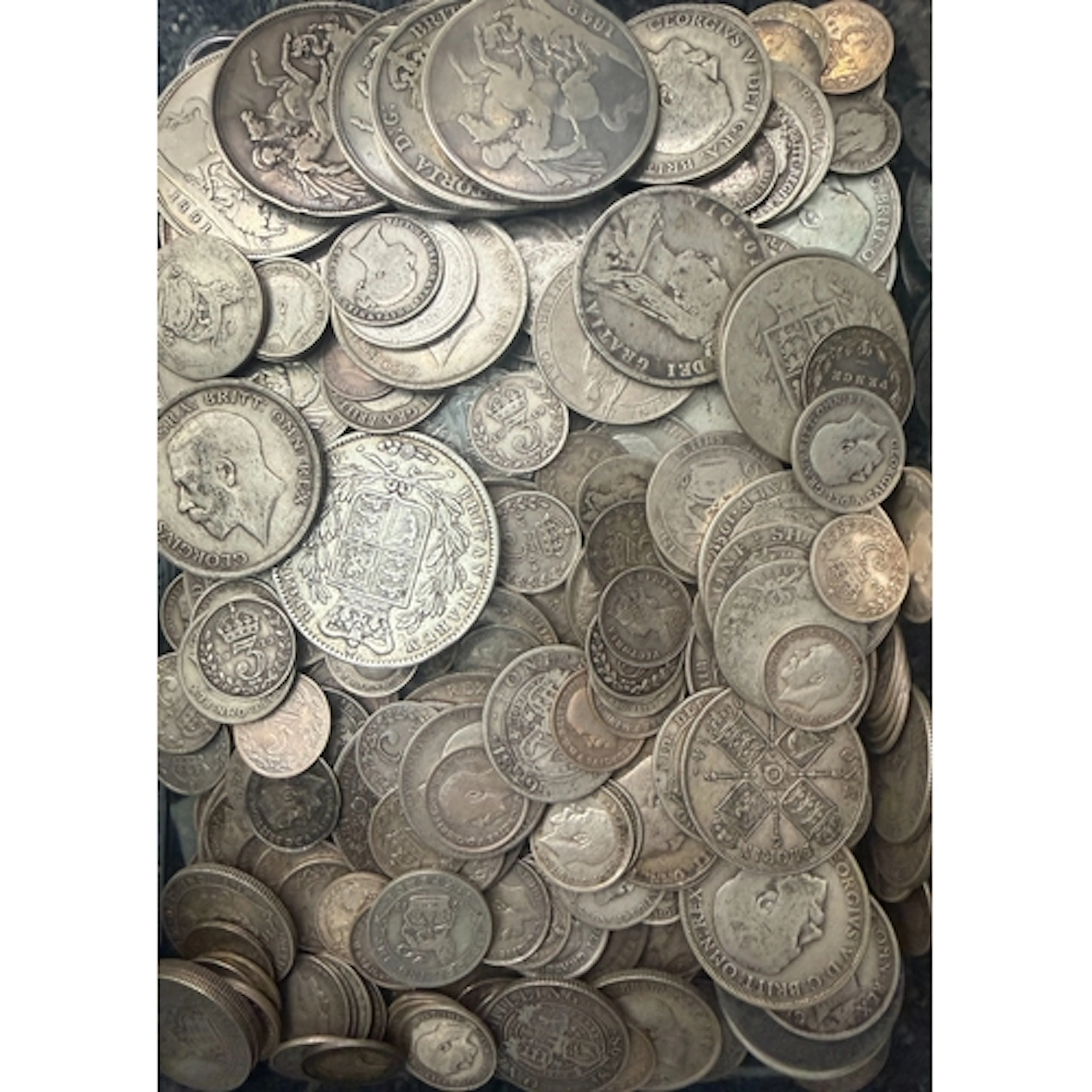 A collection of circulated UK pre-1920 silver coins, denomin...