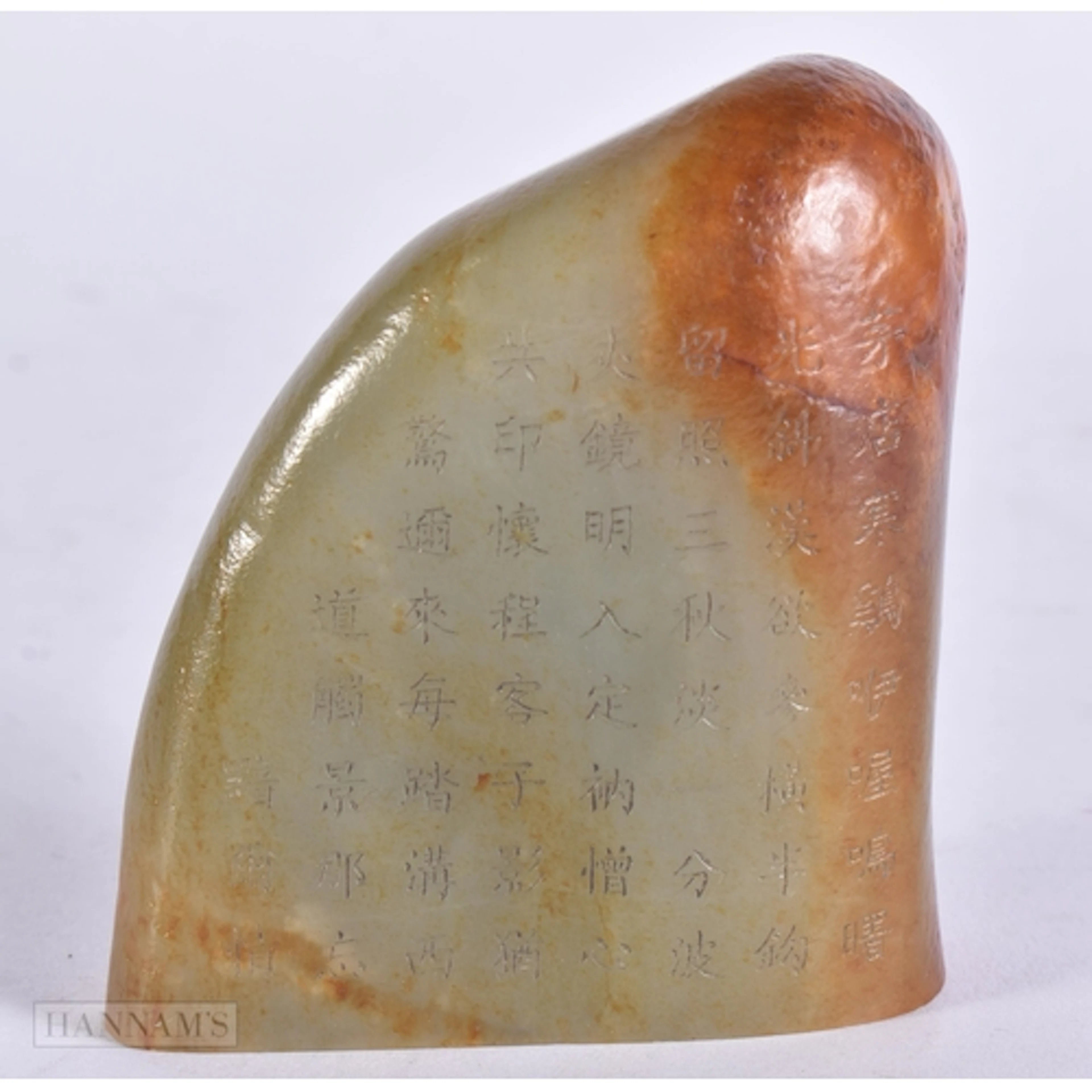 A CHINESE CARVED RUSSET JADE MOUNTAIN CALLIGRAPHY SEAL. 7.5 ...