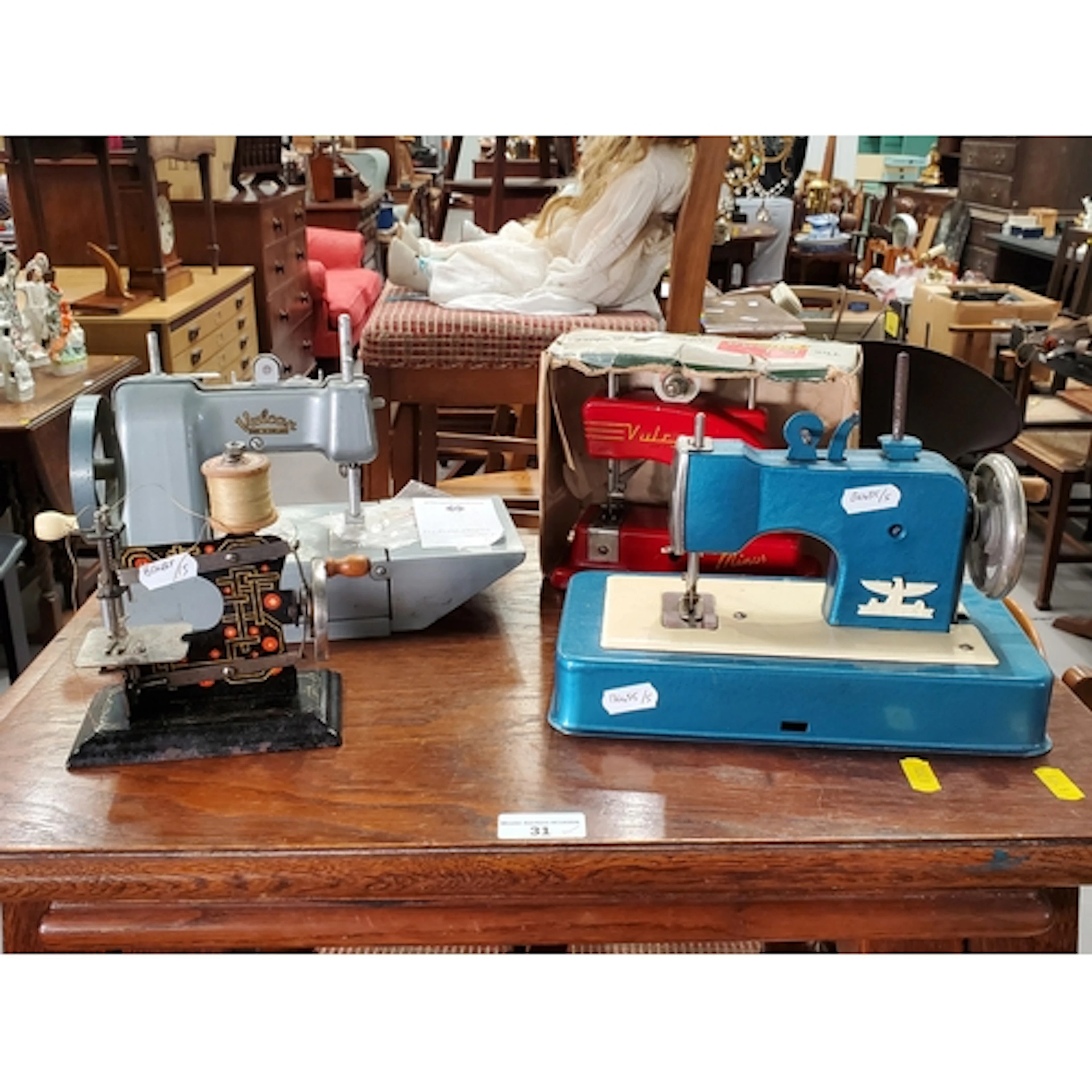 Four small Sewing Machines, (R2).