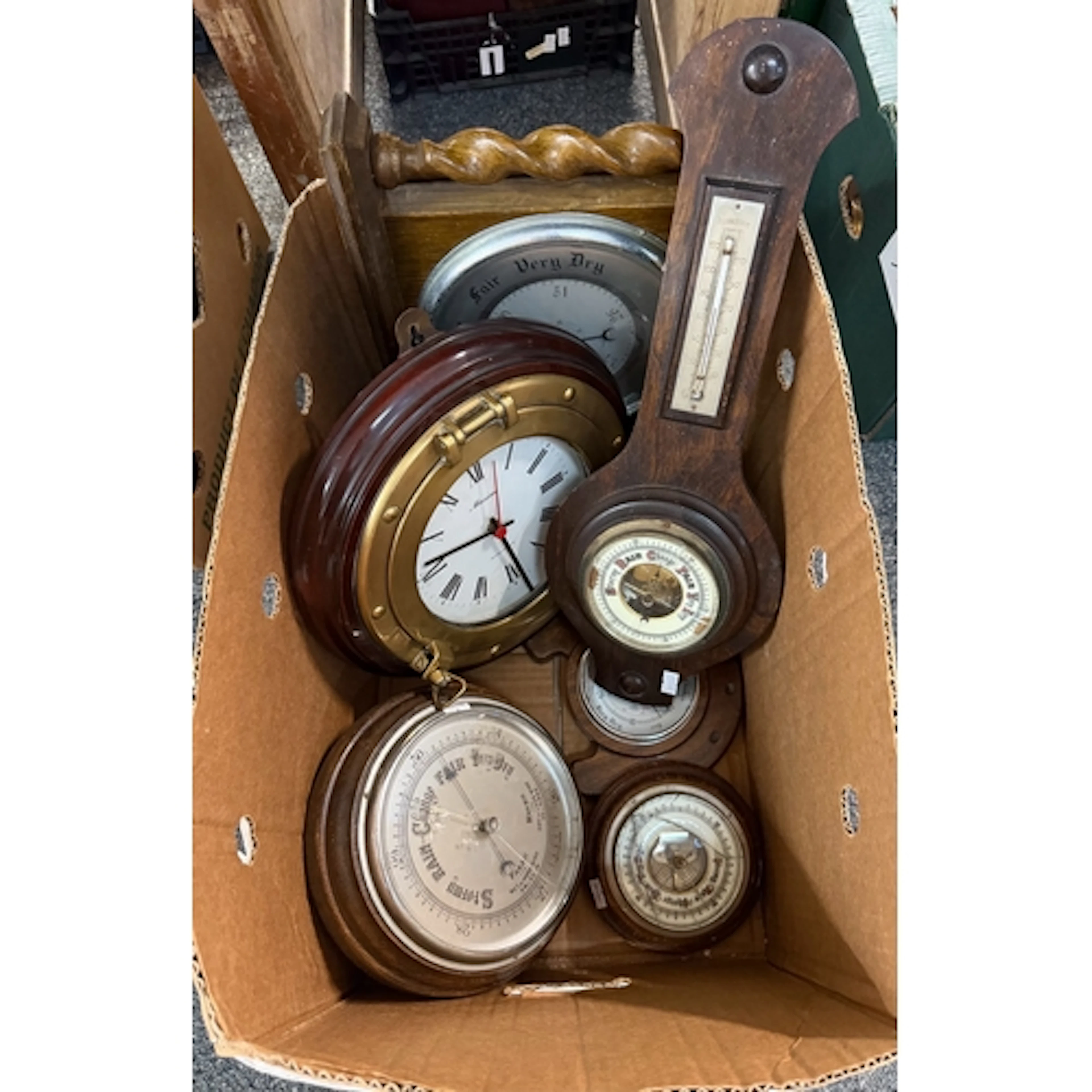 Box of assorted barometers with a brass porthole wall clock ...