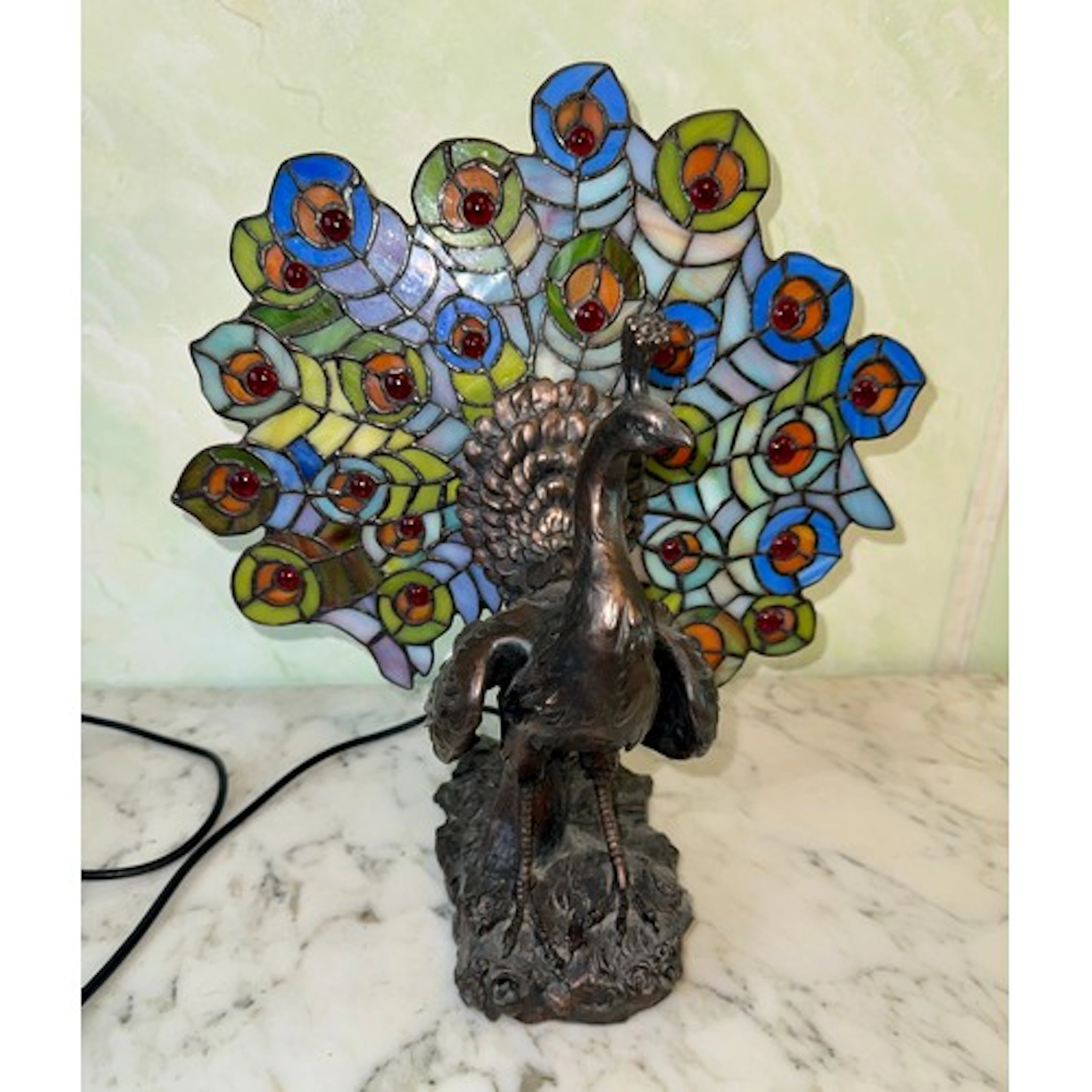 Tiffany style stained glass and metal peacock table lamp, 39...