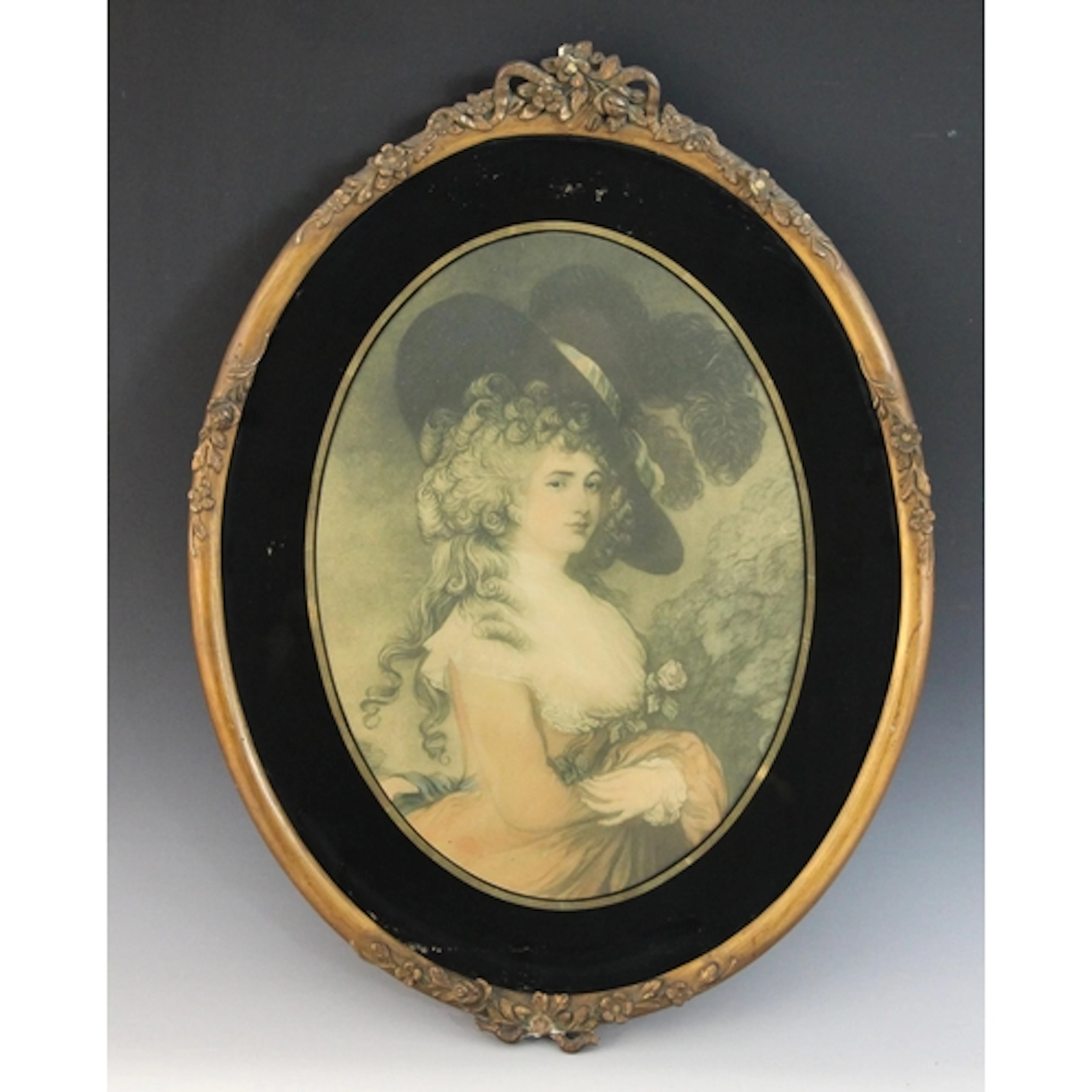 A pair of oval verre eglomise picture frames, 19th century, ...