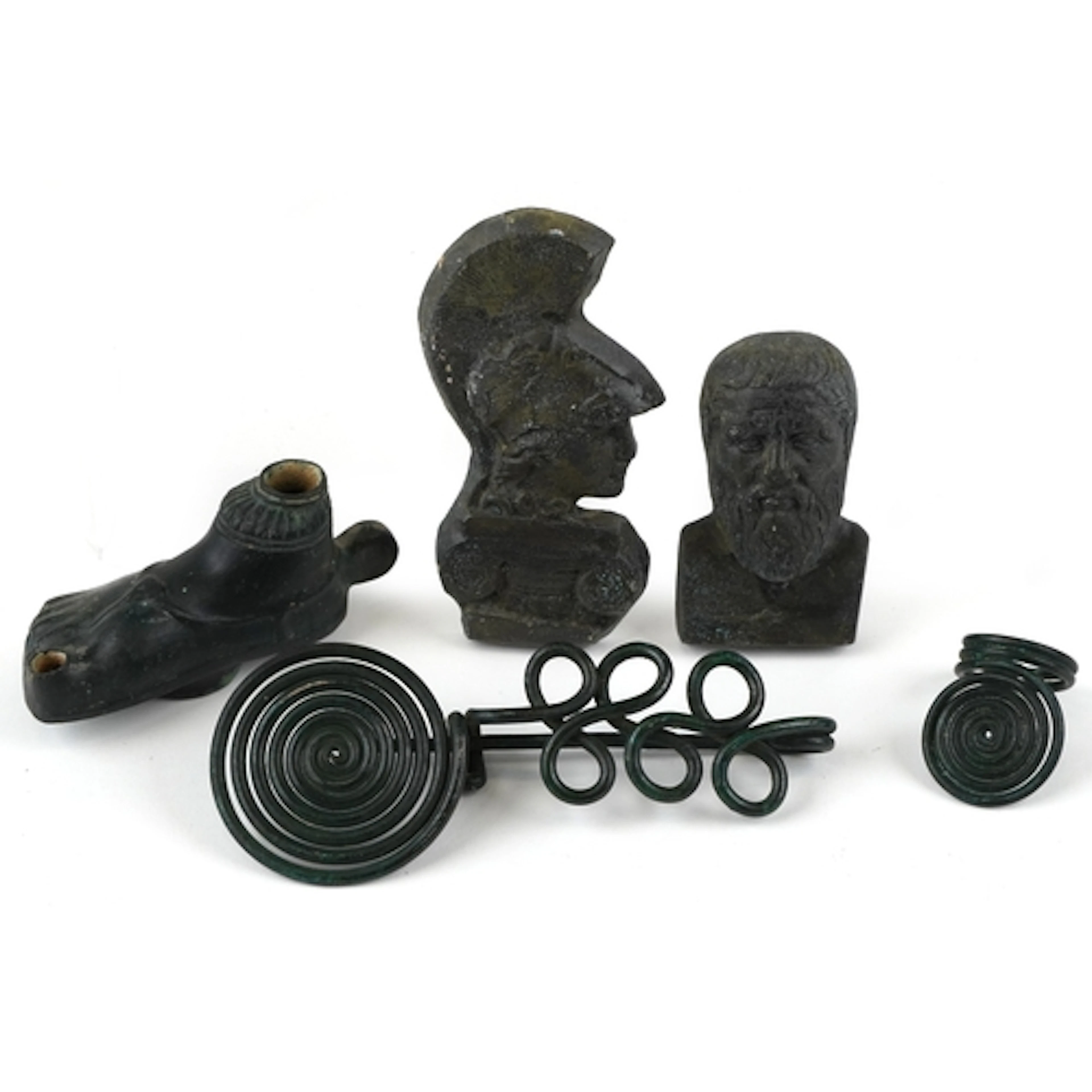 Roman style artifacts including an incense burner in the for...