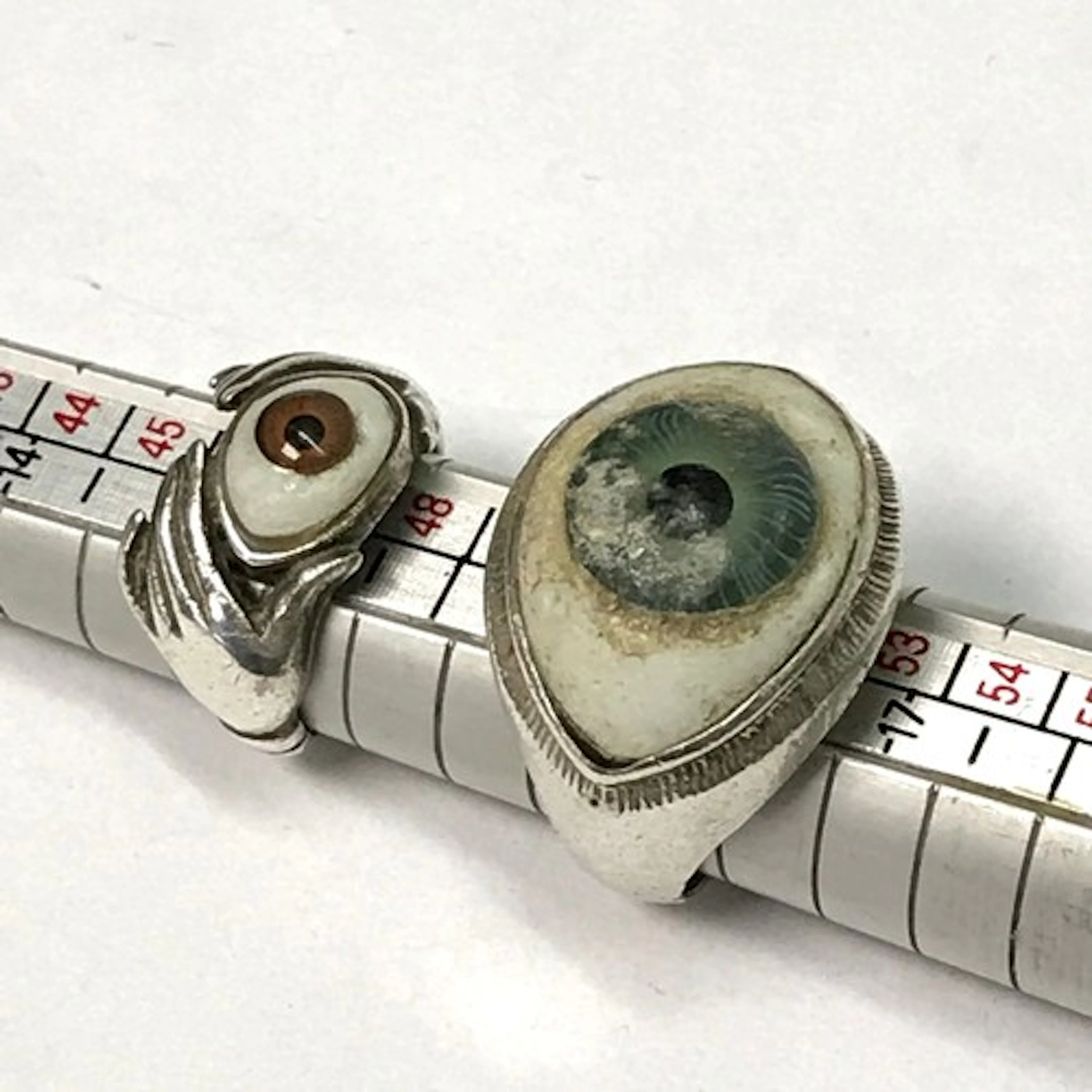 A eye ring, silver bearing London import mark set with a cer...