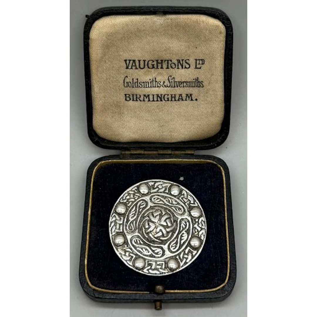 An Iona Scottish silver shield brooch by Iain MacCormick, 14...