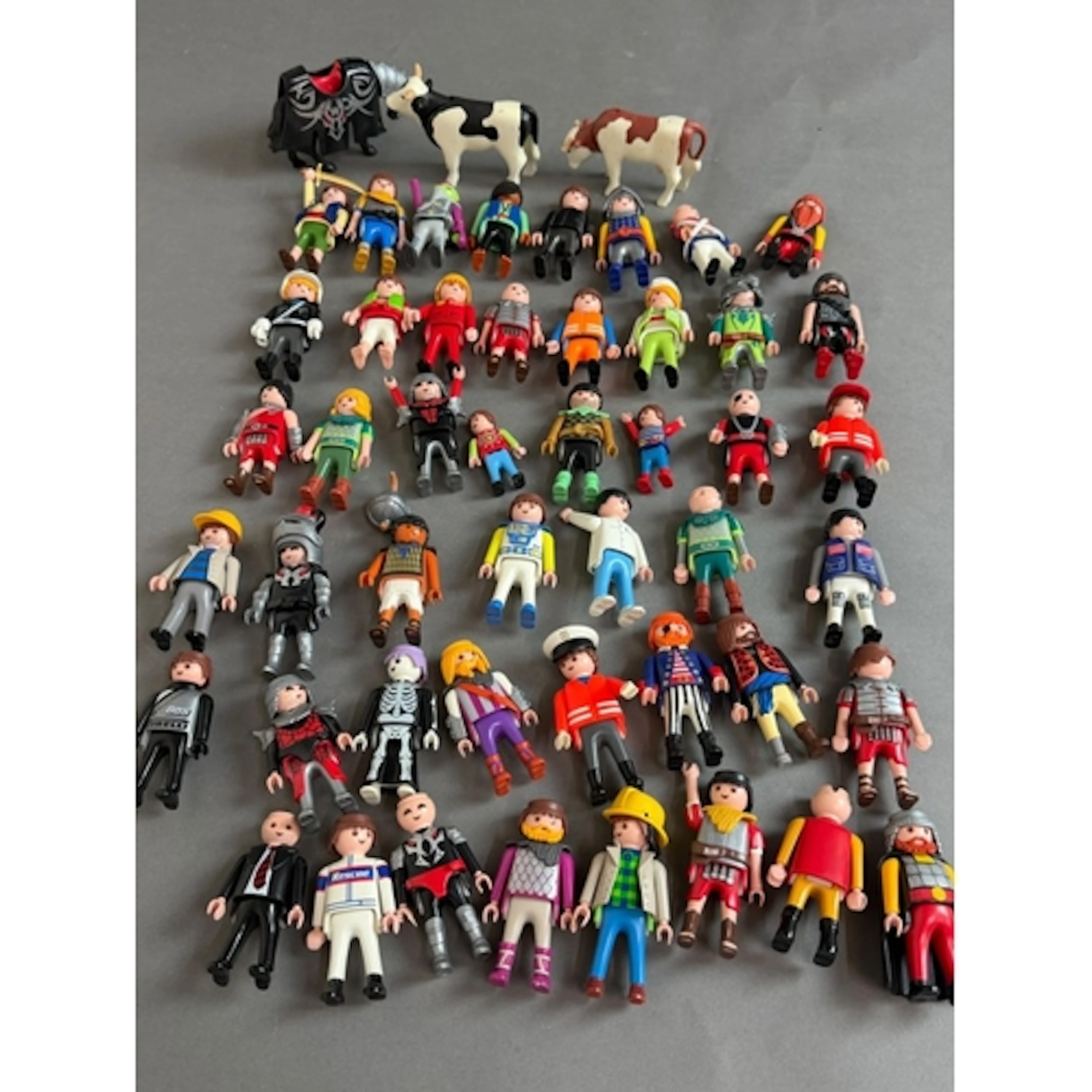 A selection of Playmobil figures, various themes and styles....