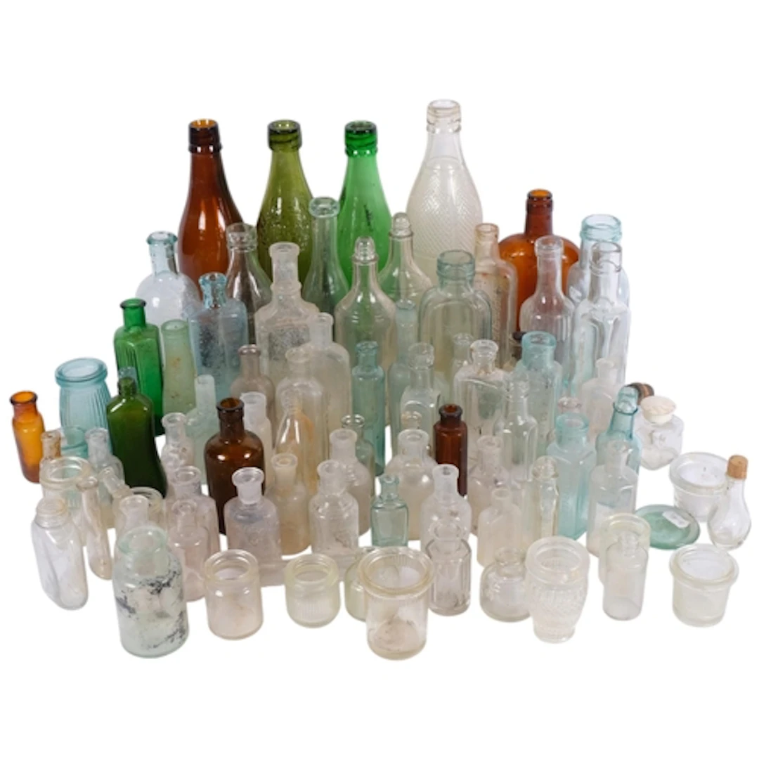 A large selection of various Antique bottles