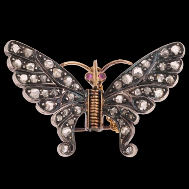 An Antique Victorian gold and silver butterfly brooch/clip, ...