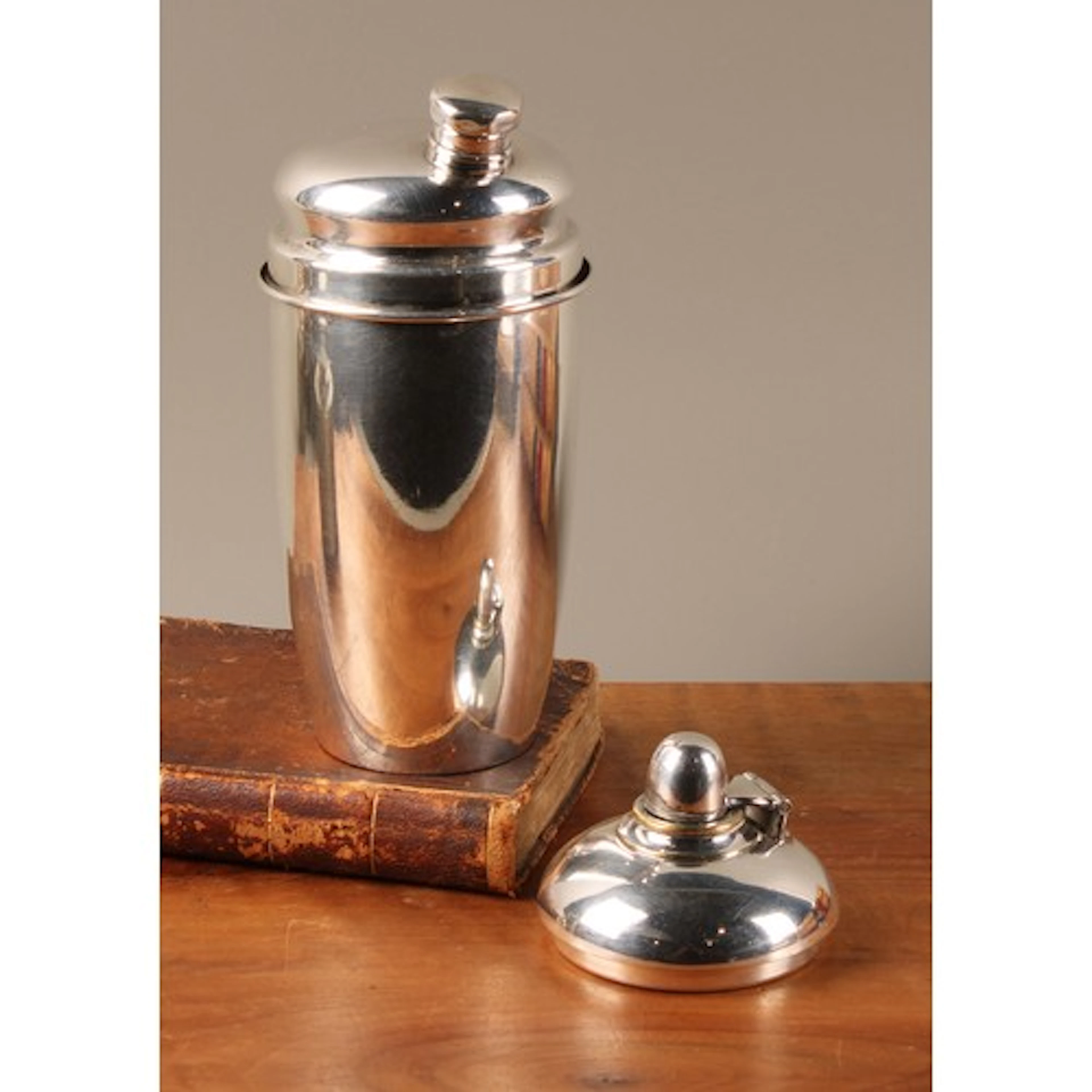 An American Art Deco E.P.N.S travelling cocktail shaker, the...