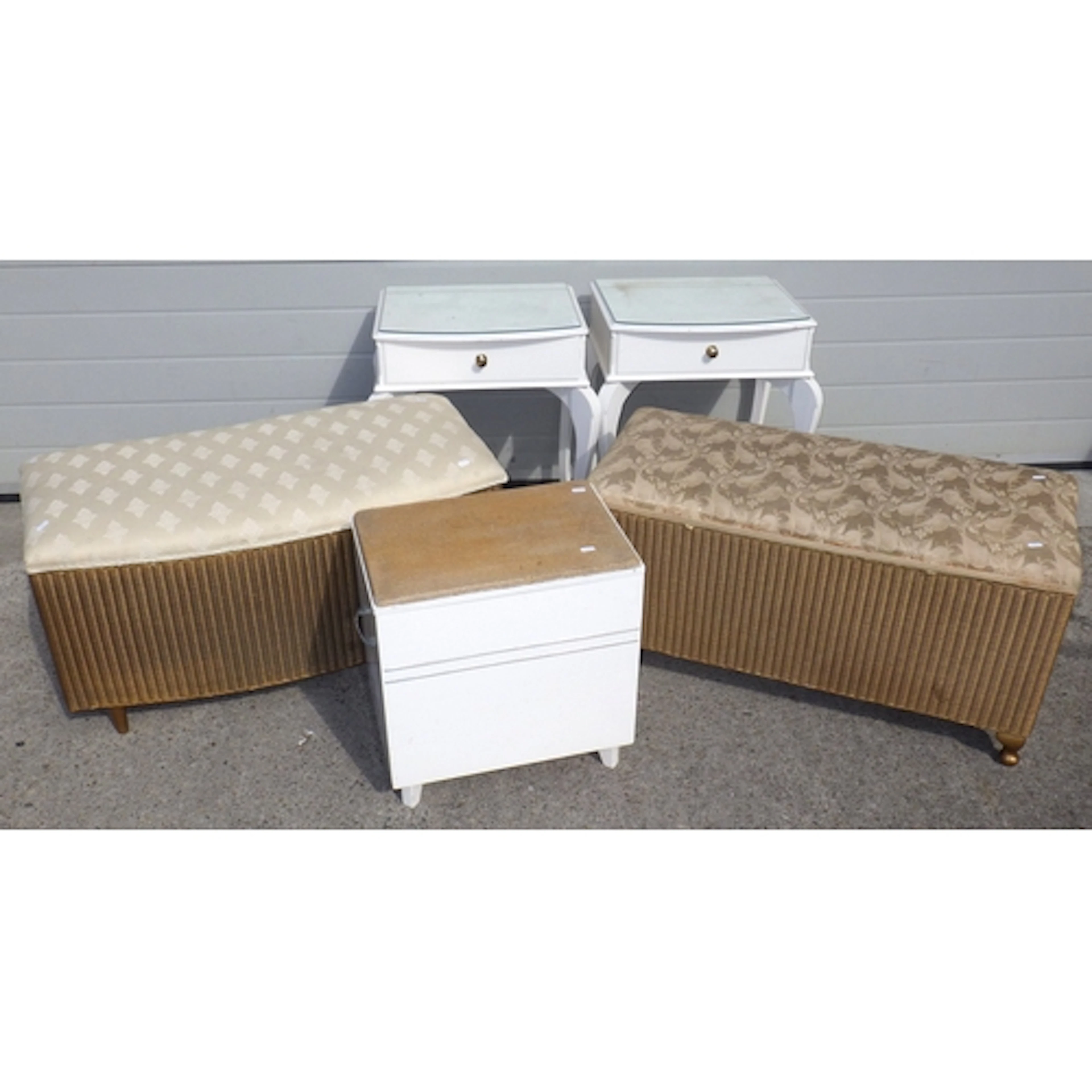 A pair of white bedside tables, two gold Lloyd Loom ottoman,...