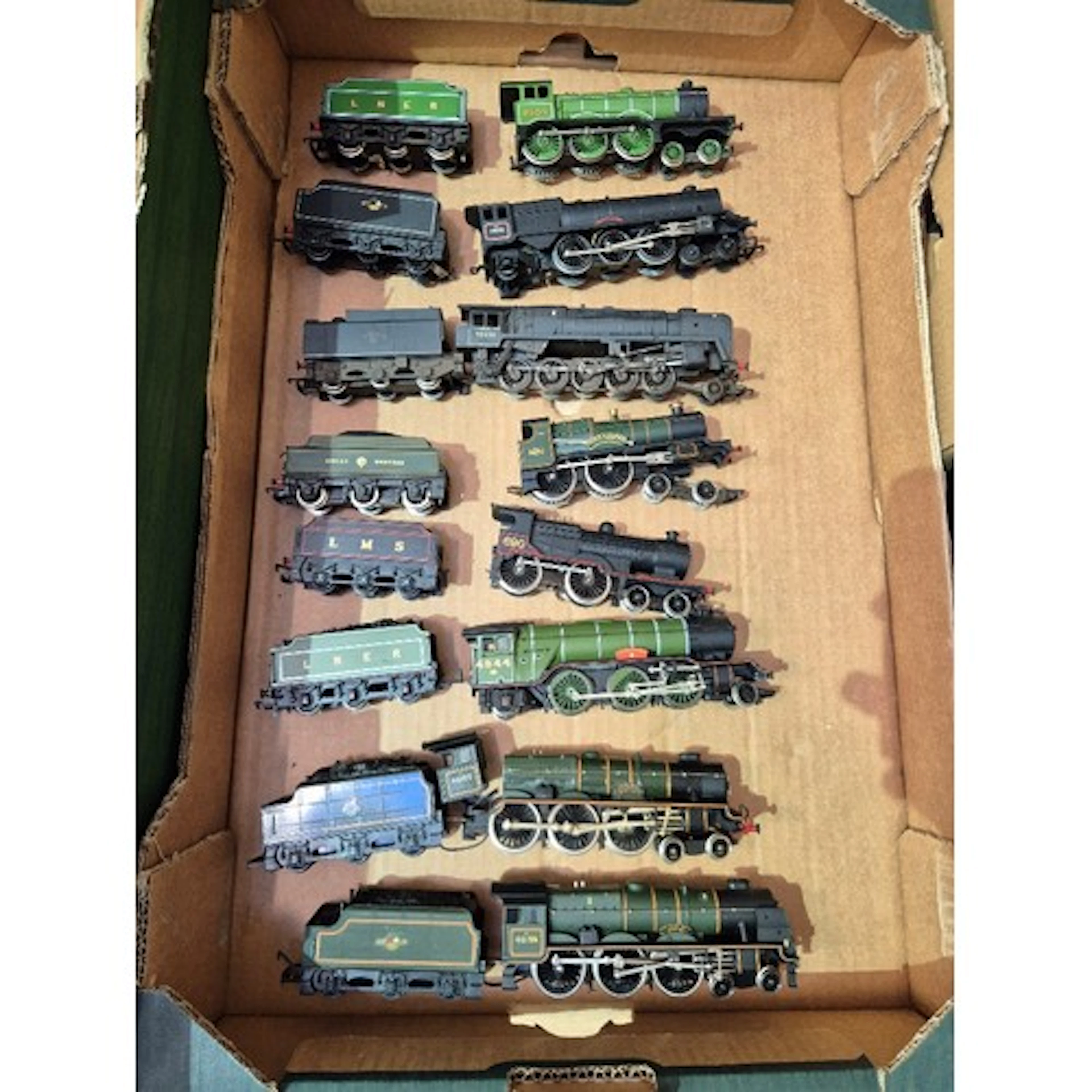 A box of assorted model train engines & tenders to include A...