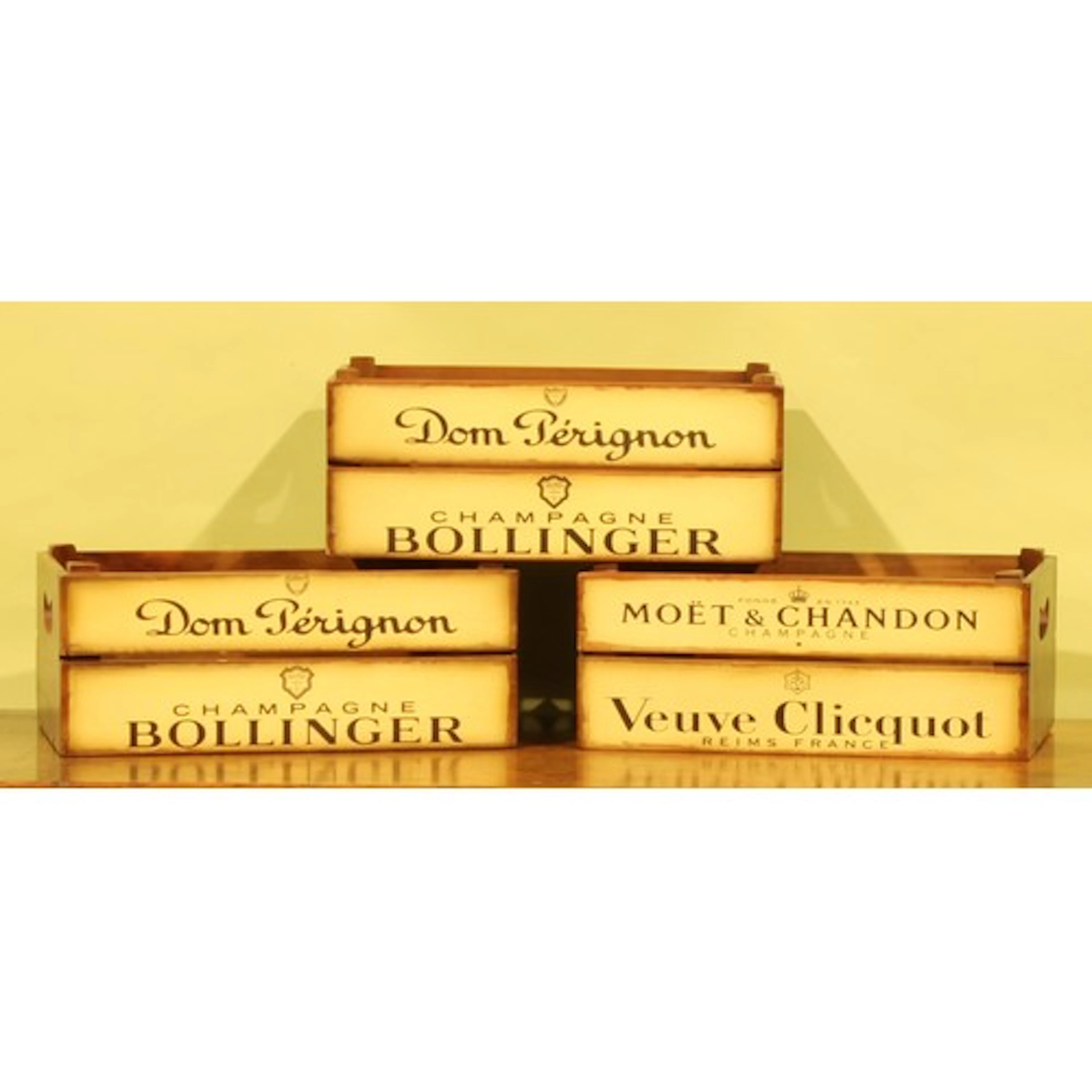 A set of three contemporary crates, as champagne advertising...
