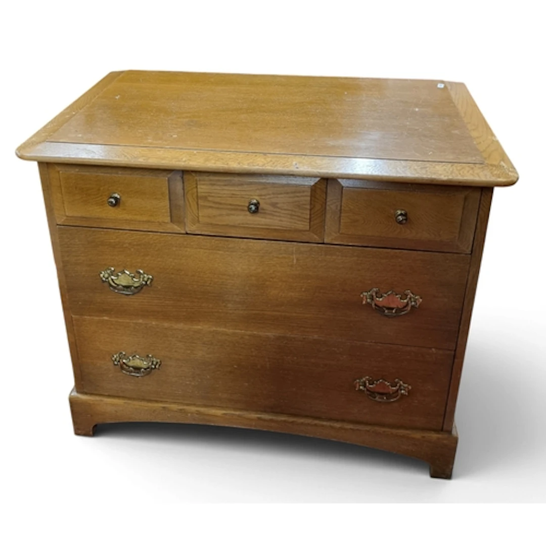 A good neat Oak Chest of Drawers along with a nest of three ...