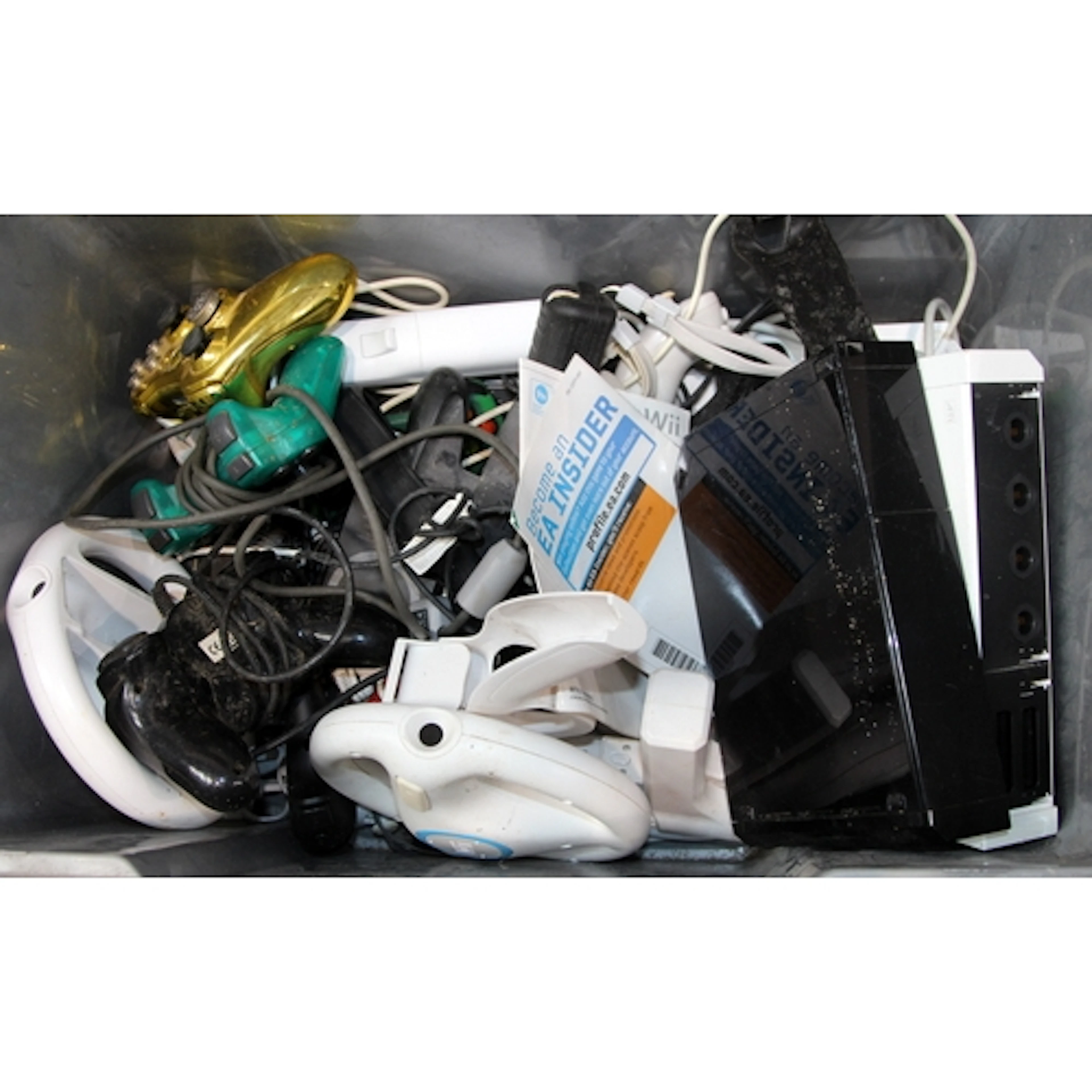 A carton of games controllers and Wii consoles