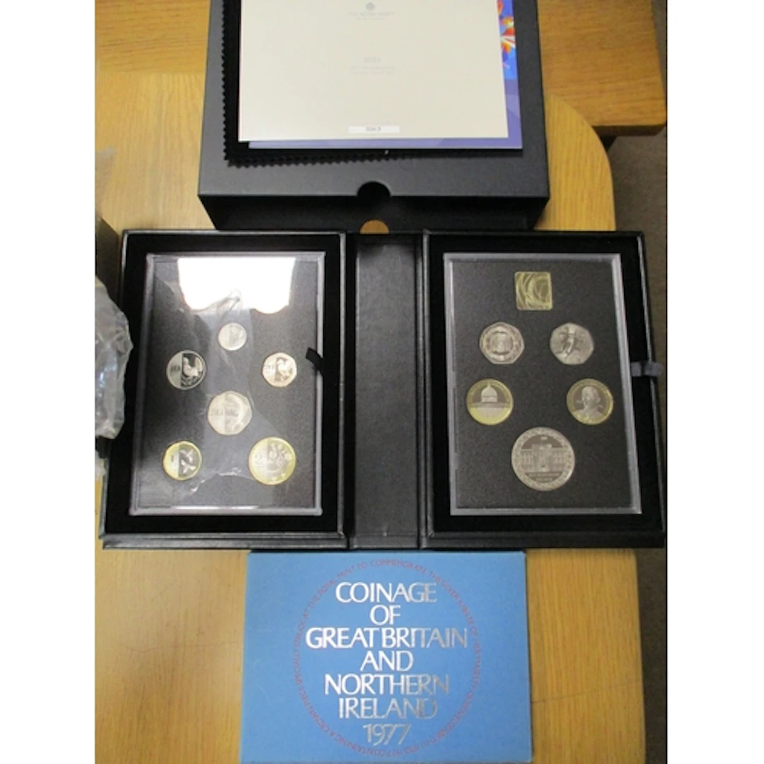 Collection of proof year sets with 1977, 2015, 2017, 2019, 2...