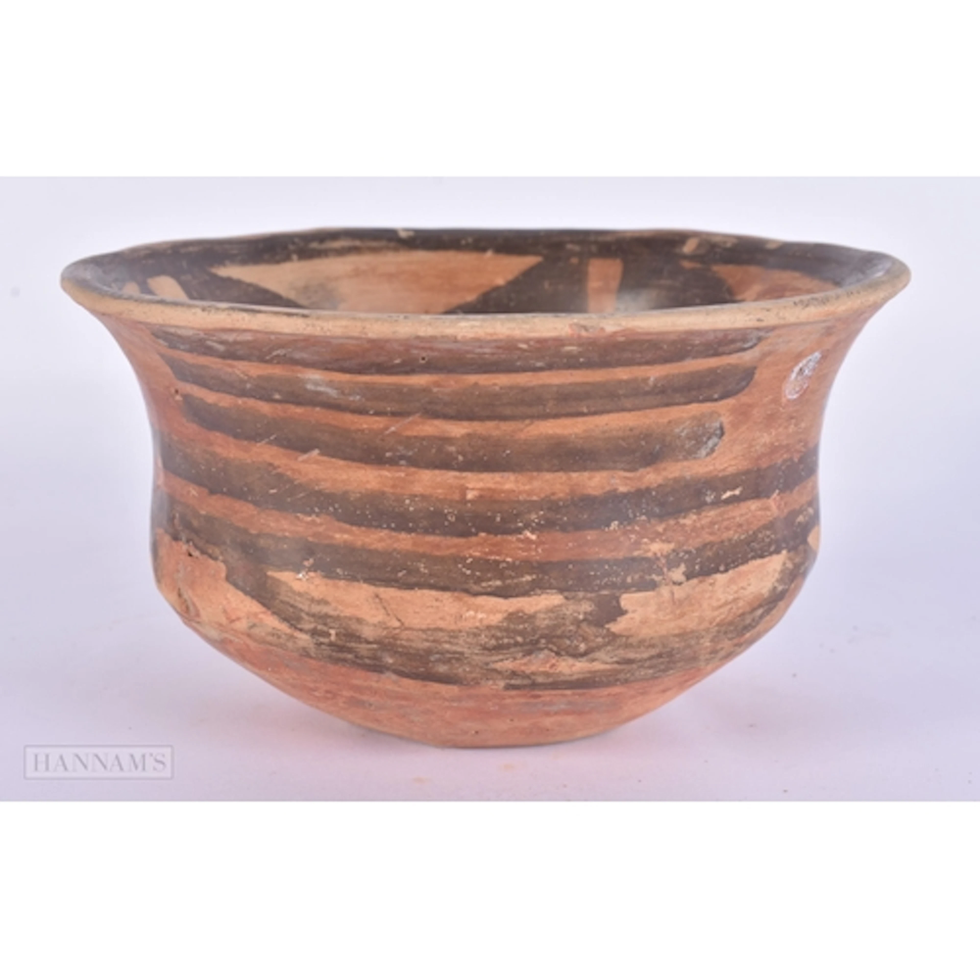 A CHINESE NEOLITHIC PERIOD POTTERY BOWL painted with motifs....