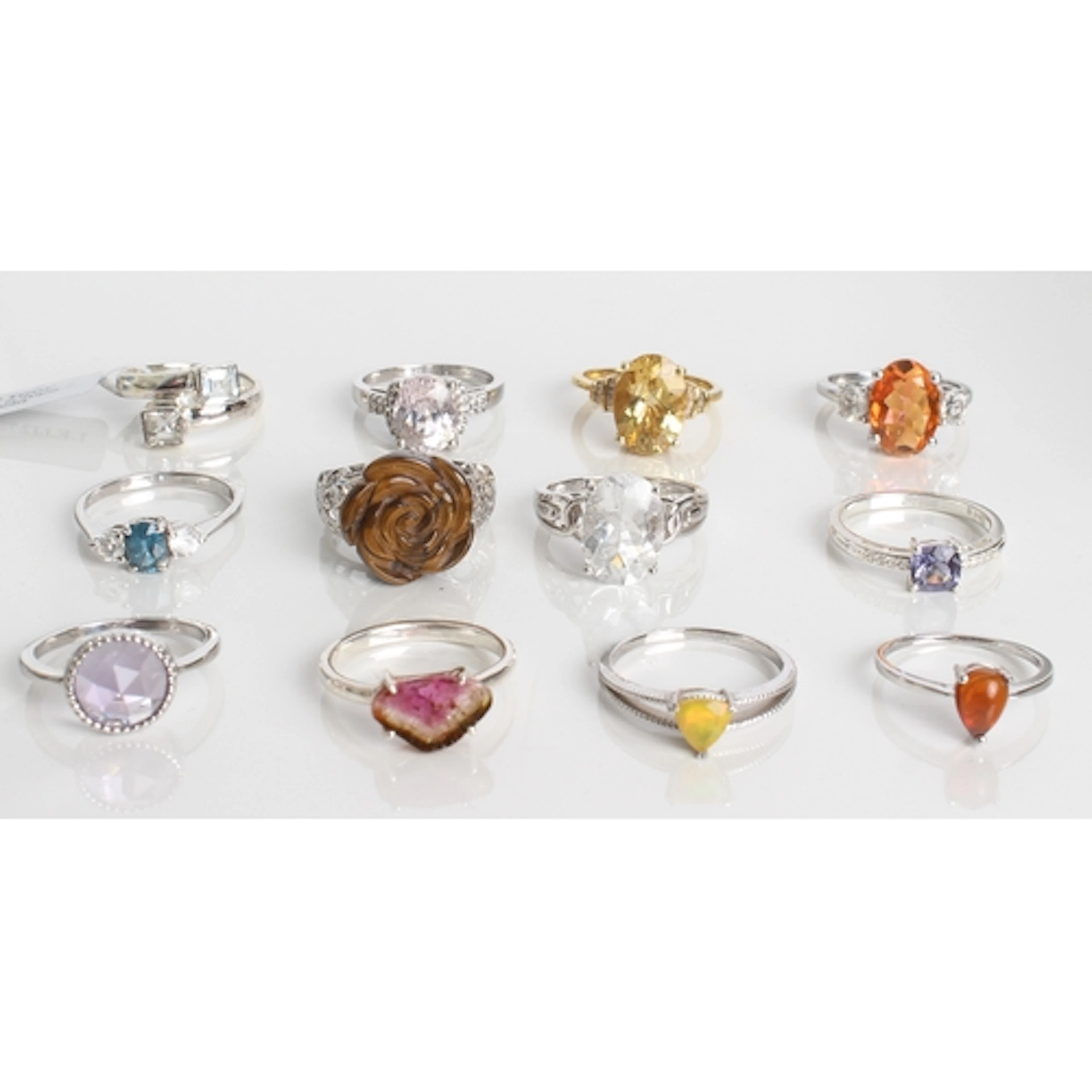 Twelve sterling silver rings - comprising a Cullinan topaz r...