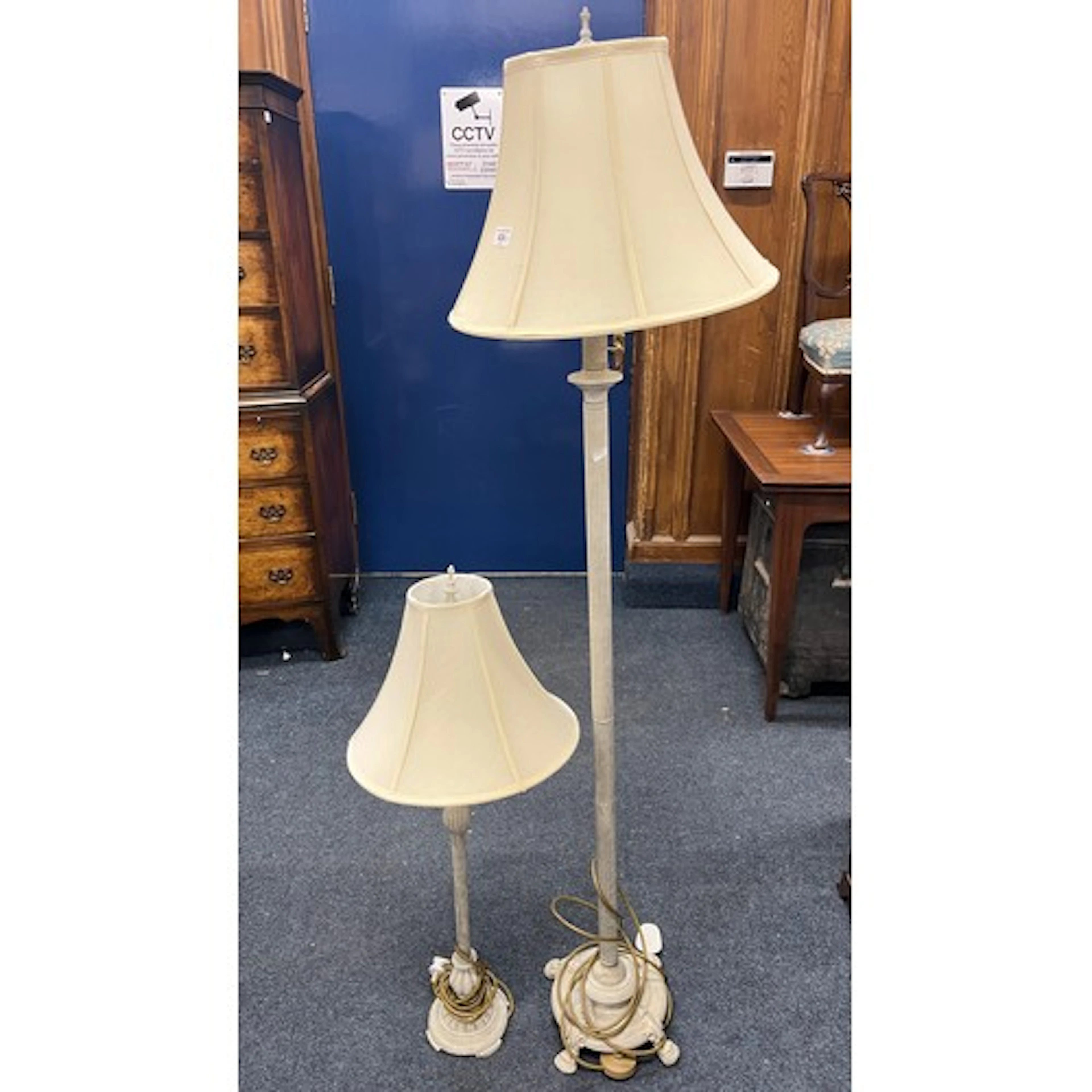 Two modern table and floor lamps with matching shades.