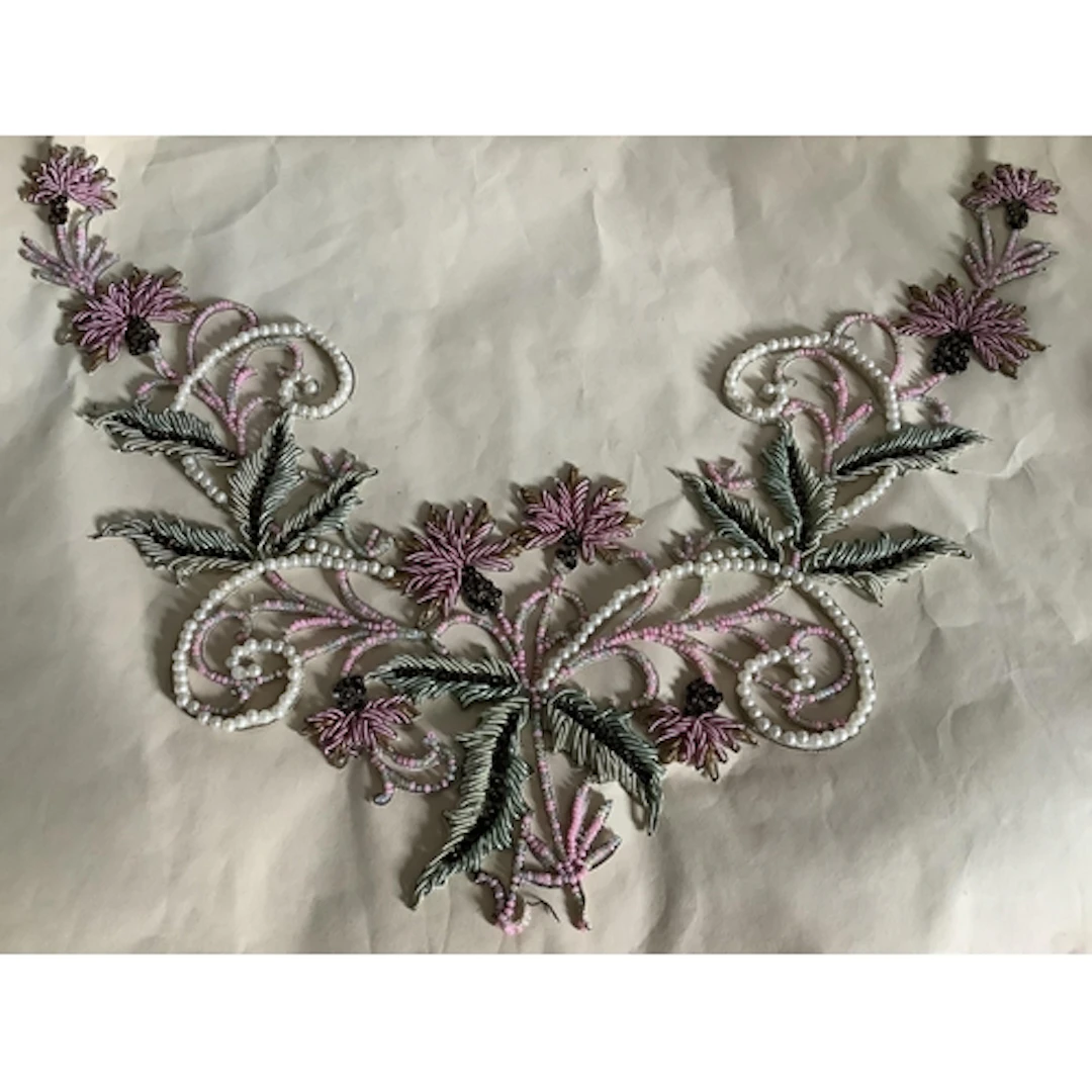 A collection of beaded and sequin appliqués, to include an e...
